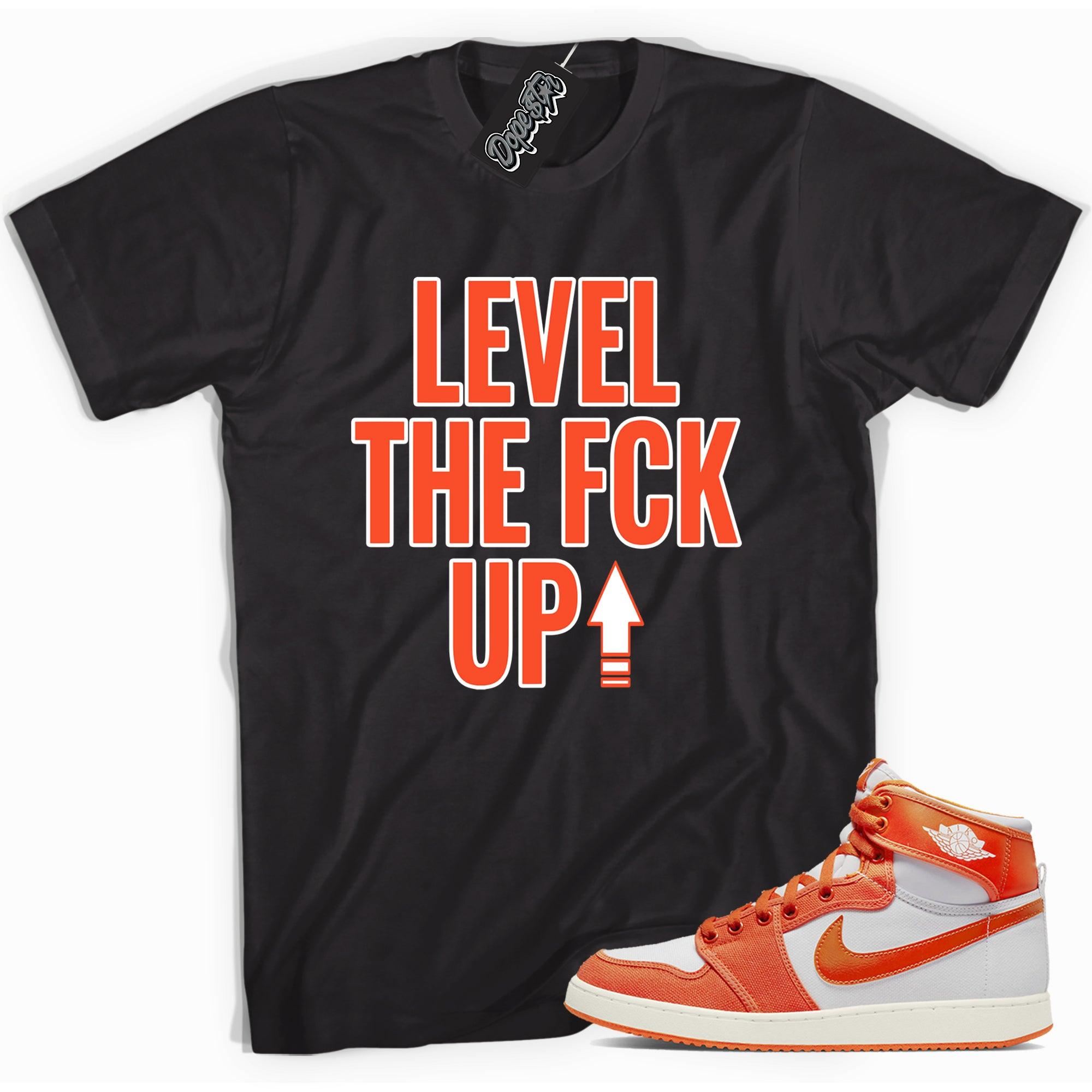 Cool black graphic tee with 'Level Up' print, that perfectly matches Air Jordan 1 KO syracuse sneakers.