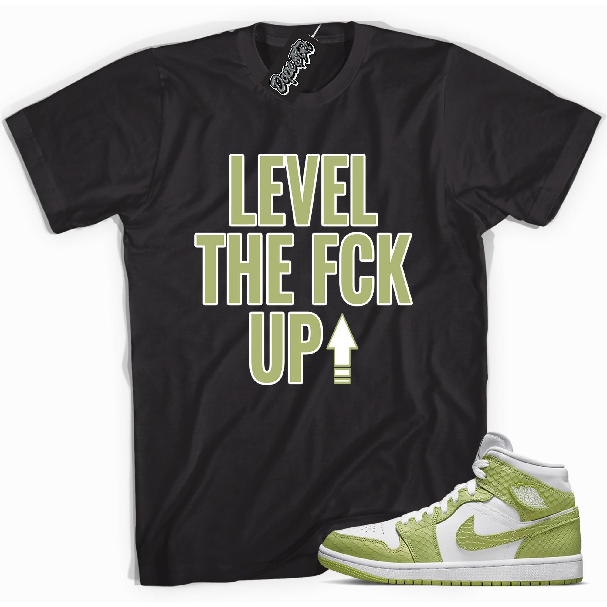 Cool black graphic tee with 'Level Up' print, that perfectly matches Air Jordan 1 Mid Green Python sneakers.