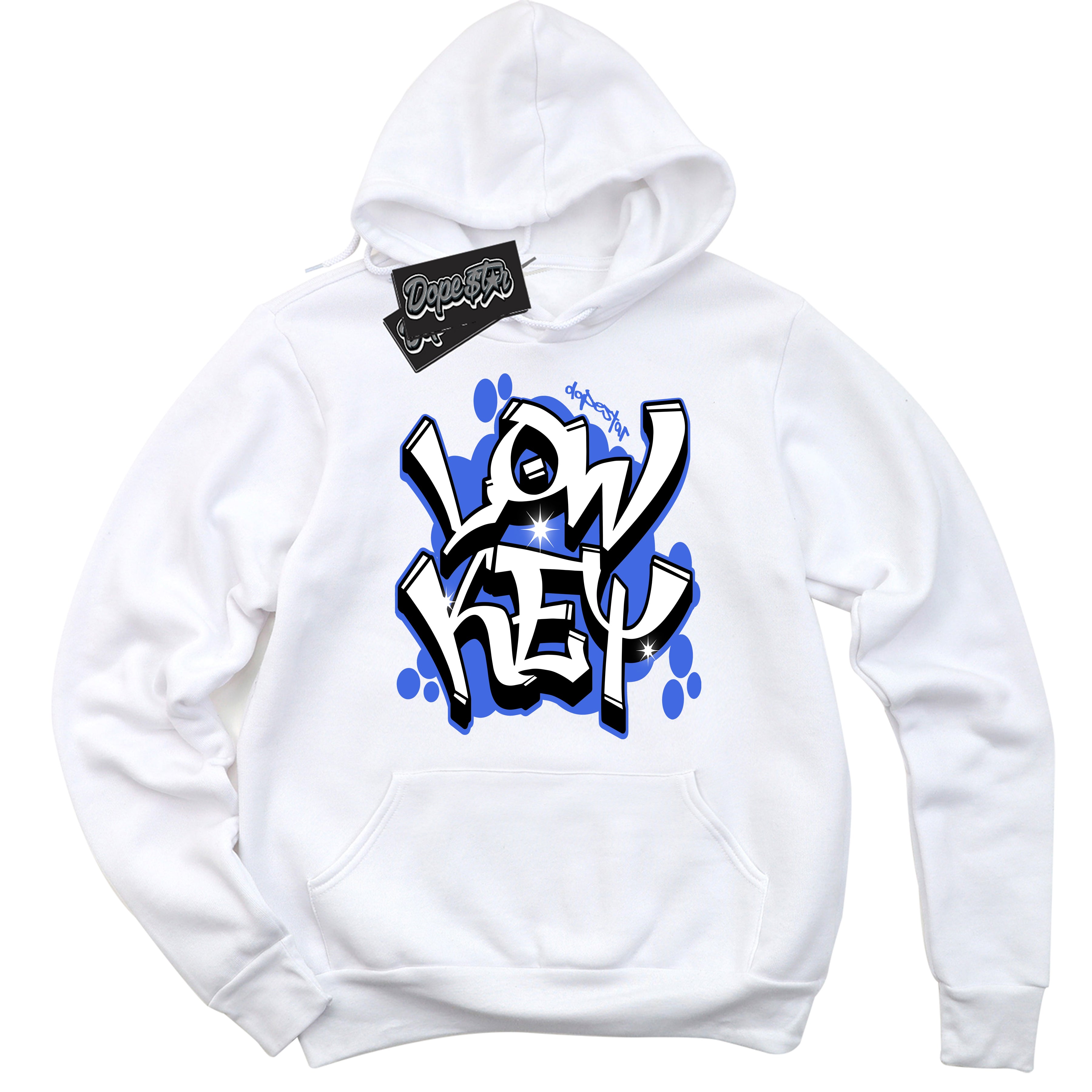 White “Low Key” Hoodie by Dope Star Brand®, styled to match Royal 1s sneakers