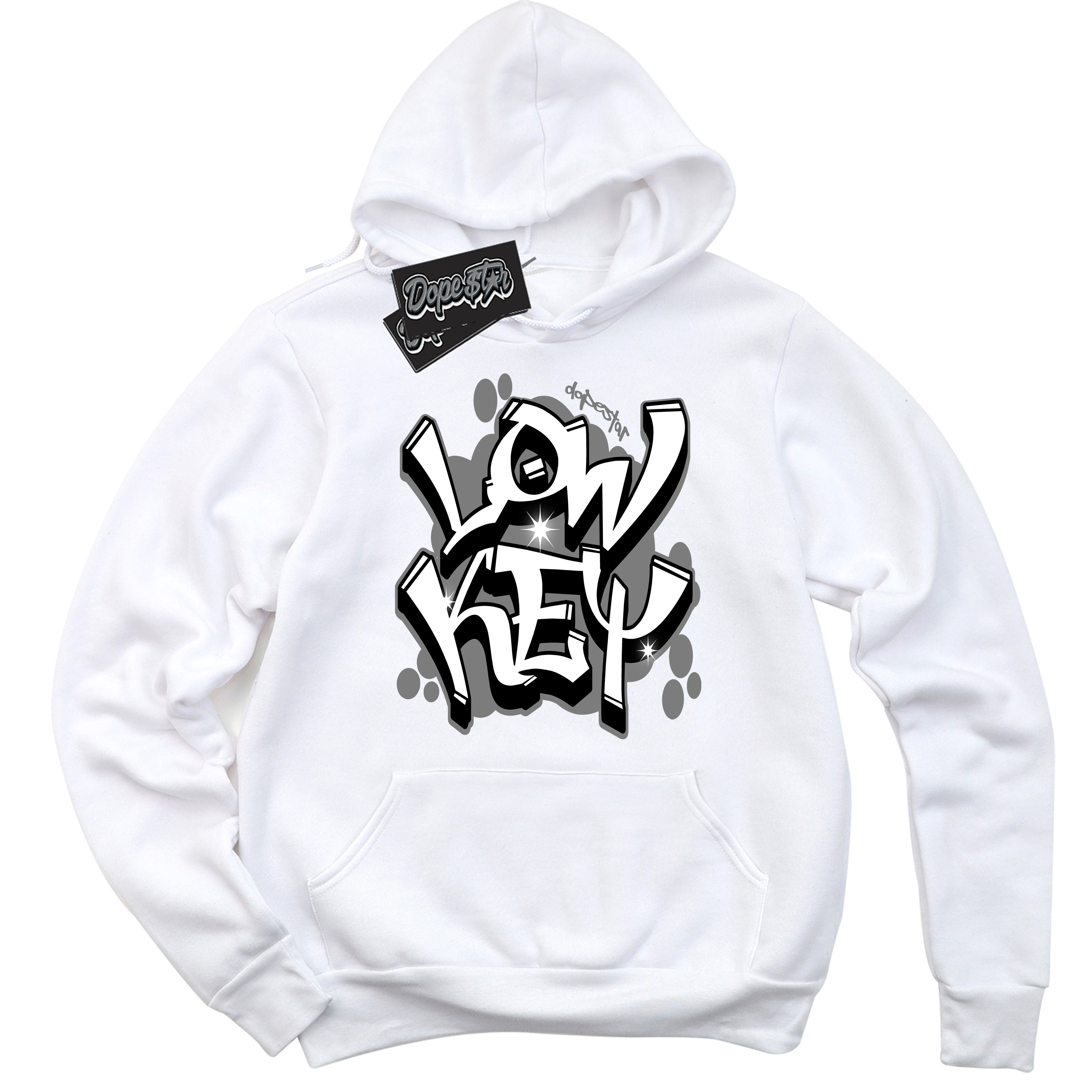 White “Low Key” Hoodie by Dope Star Brand®, styled to match Shadow 1s sneakers