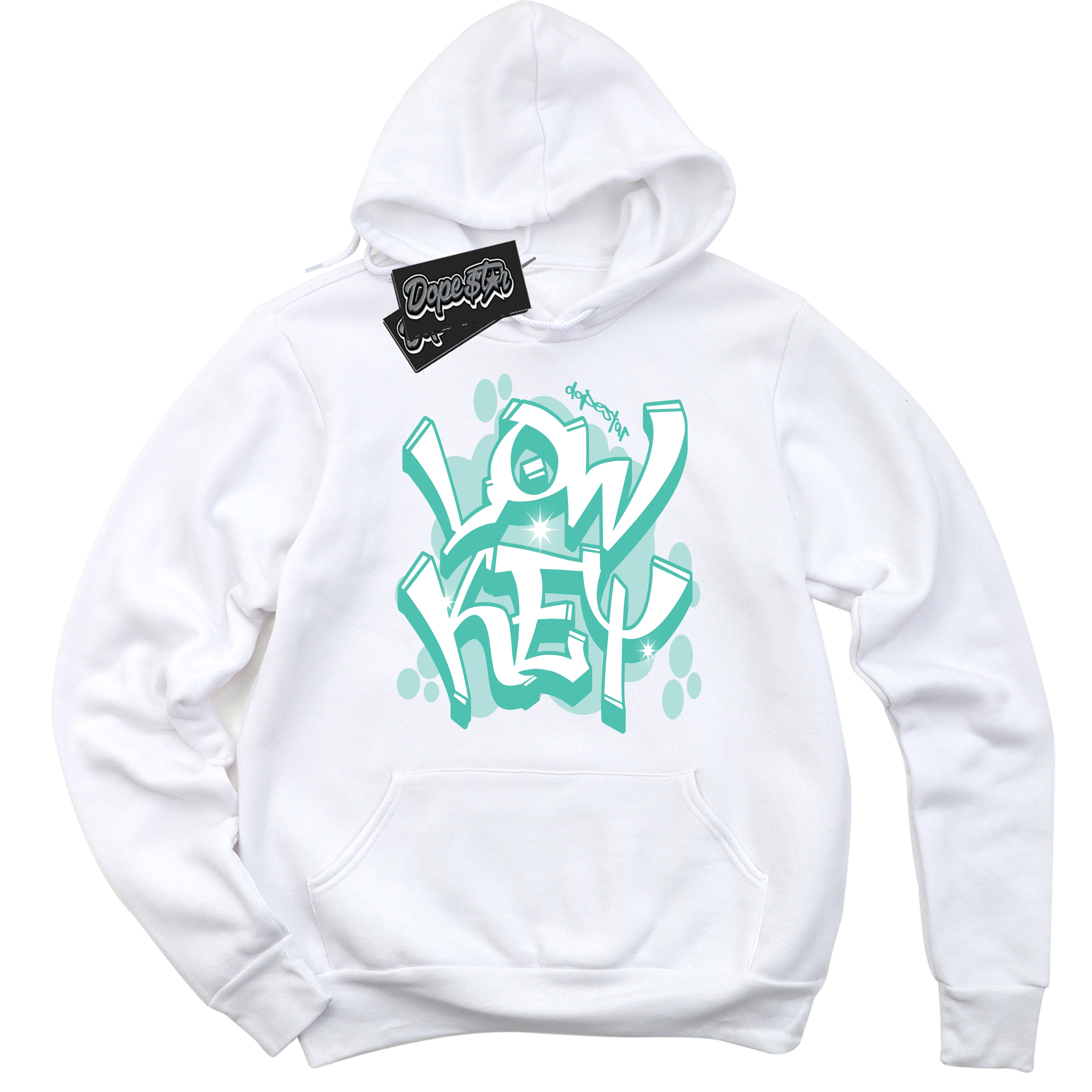 White “Low Key” Hoodie by Dope Star Brand®, styled to match Teal 1s sneakers