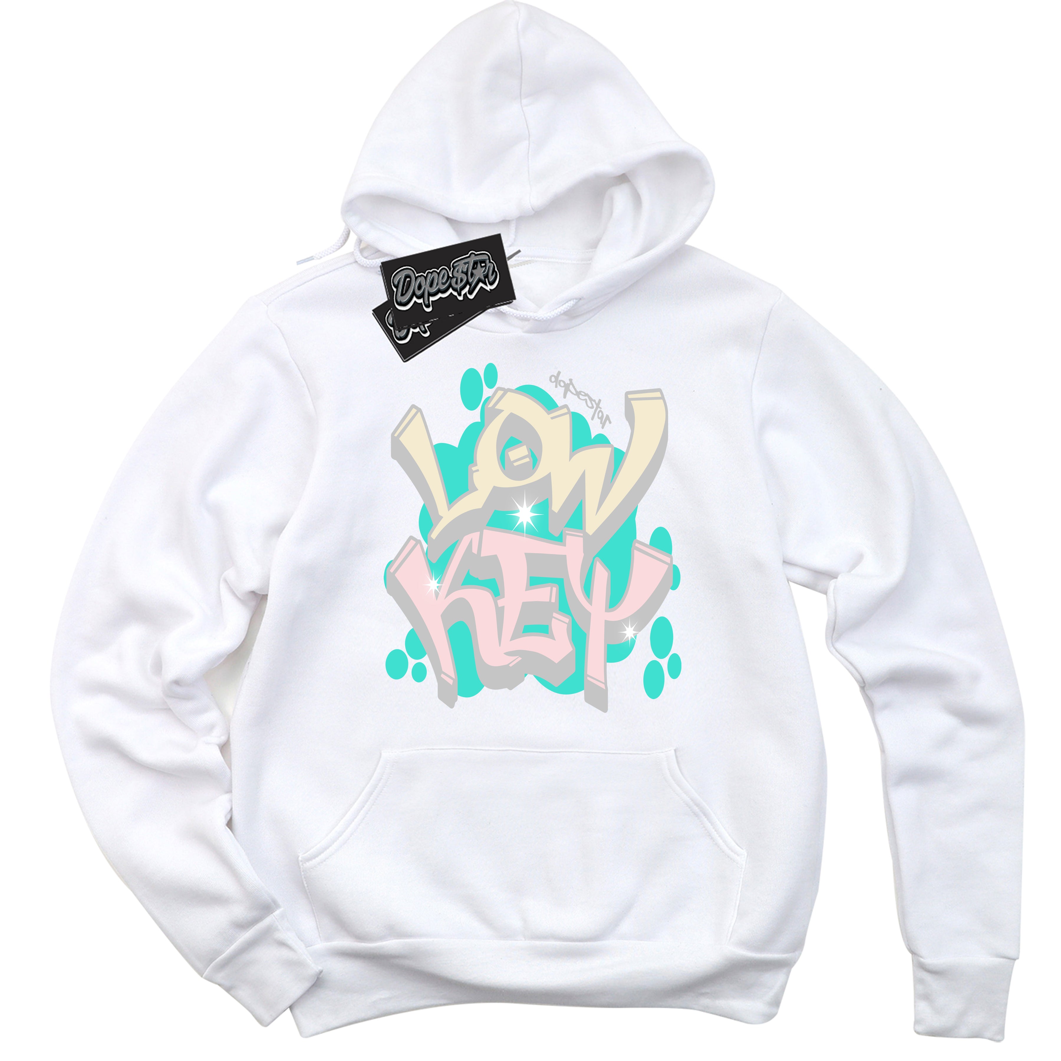 White “Low Key” Hoodie by Dope Star Brand®, styled to match Soft Pearl 1s sneakers