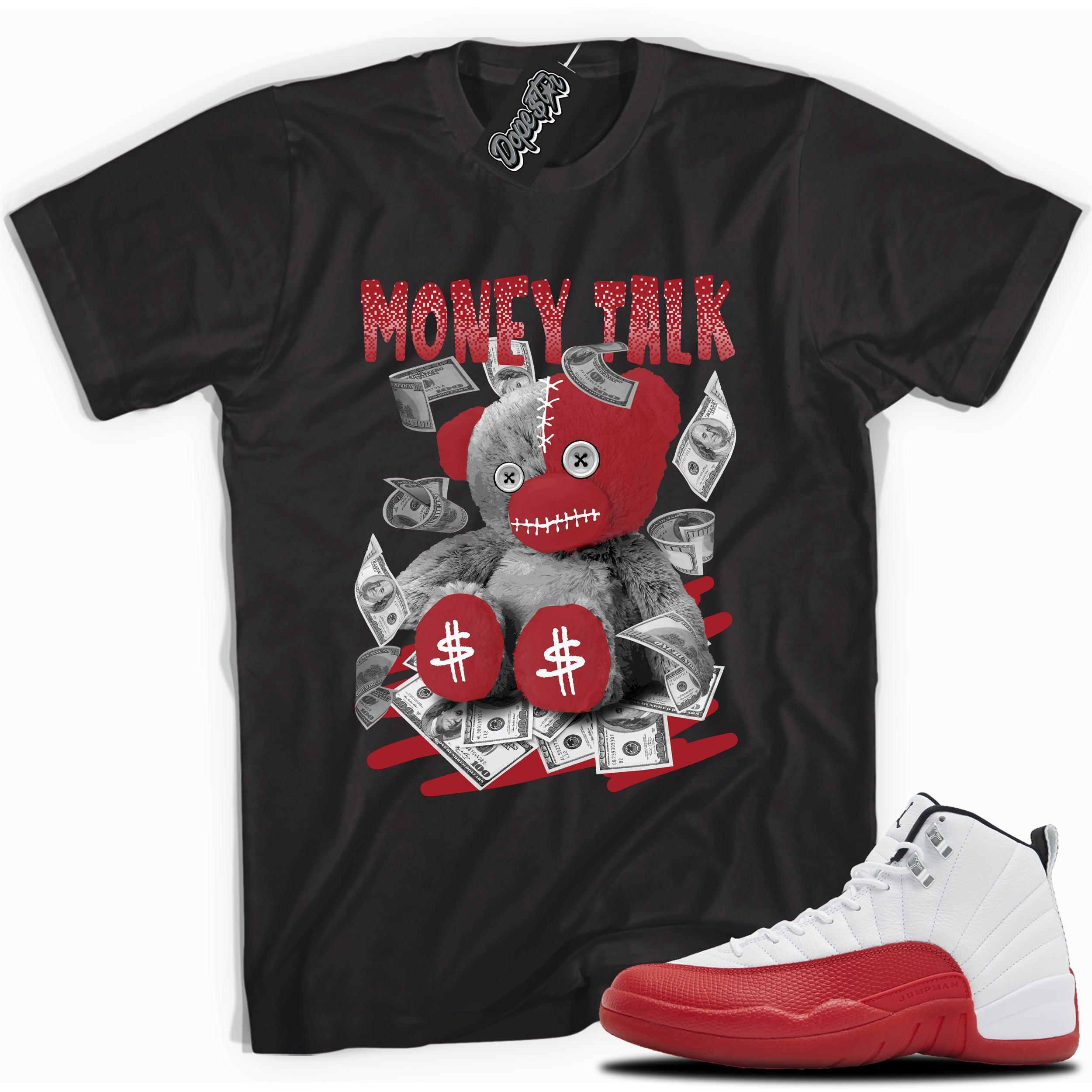 Cool Black graphic tee with “ MONEY TALK BEAR ” print, that perfectly matches Air Jordan 12 Retro Cherry Red 2023 red and white sneakers