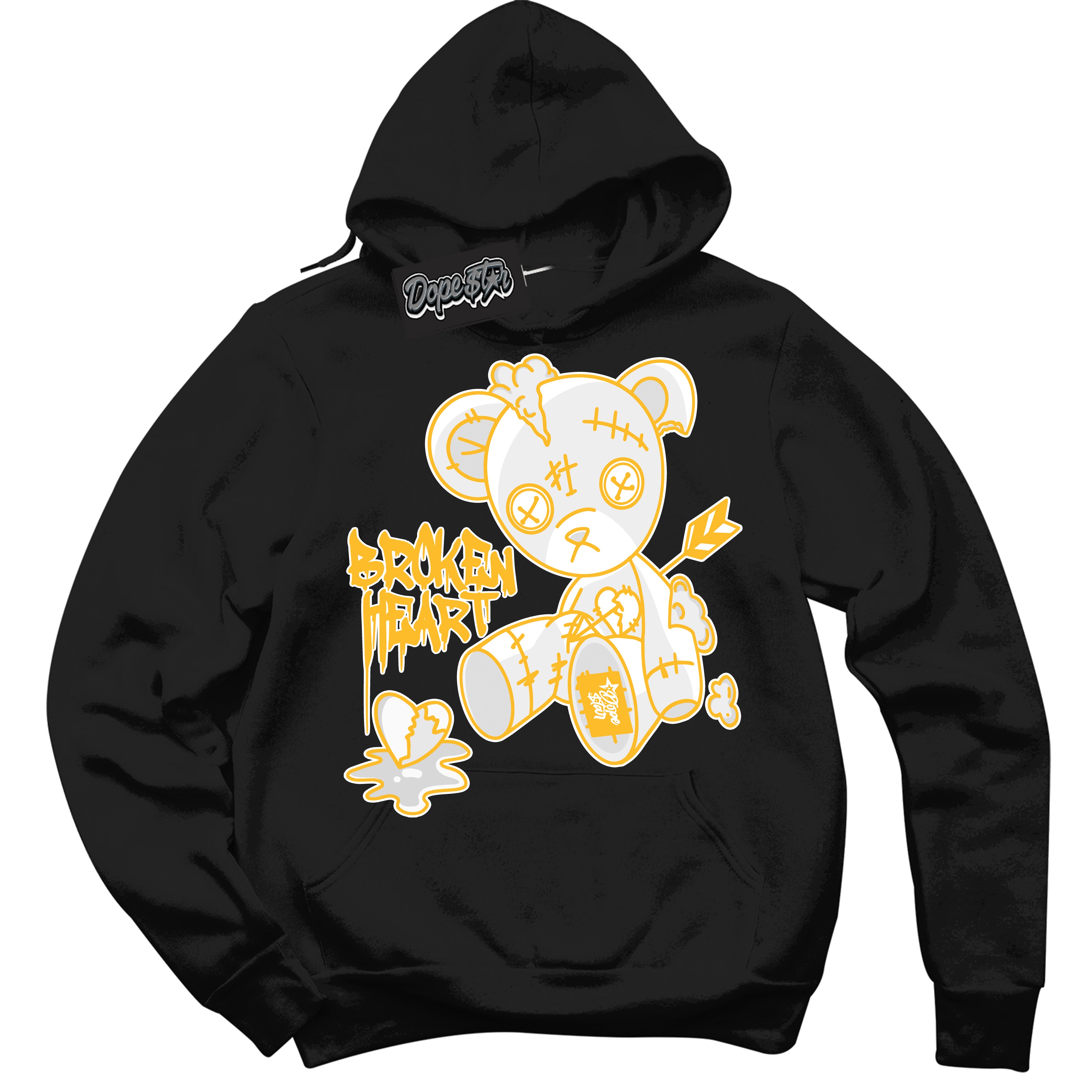 Cool Black Hoodie with “ Broken Heart Bear '' design that Perfectly Matches White University Gold Sneakers.