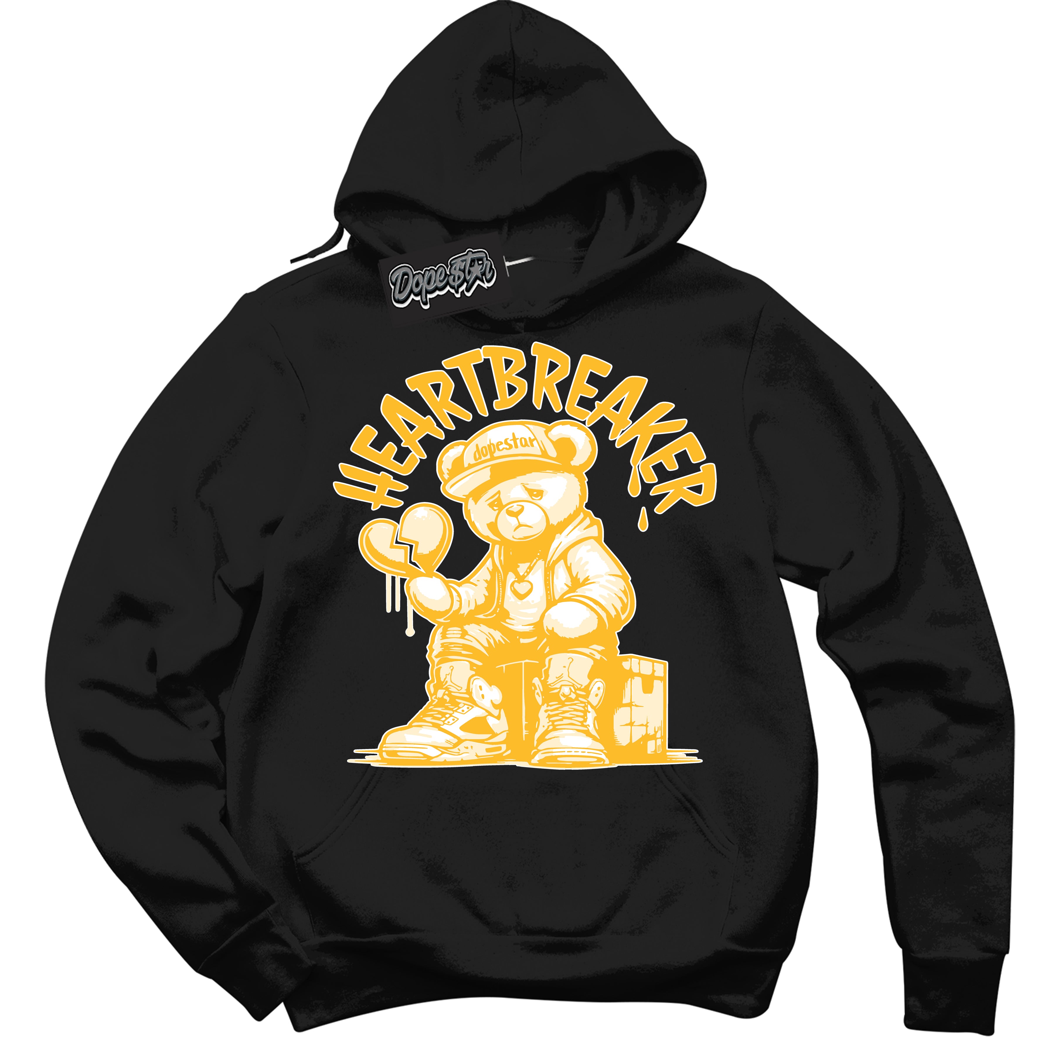 Cool Black Hoodie with “ Heartbreaker Bear '' design that Perfectly Matches White University Gold Sneakers.