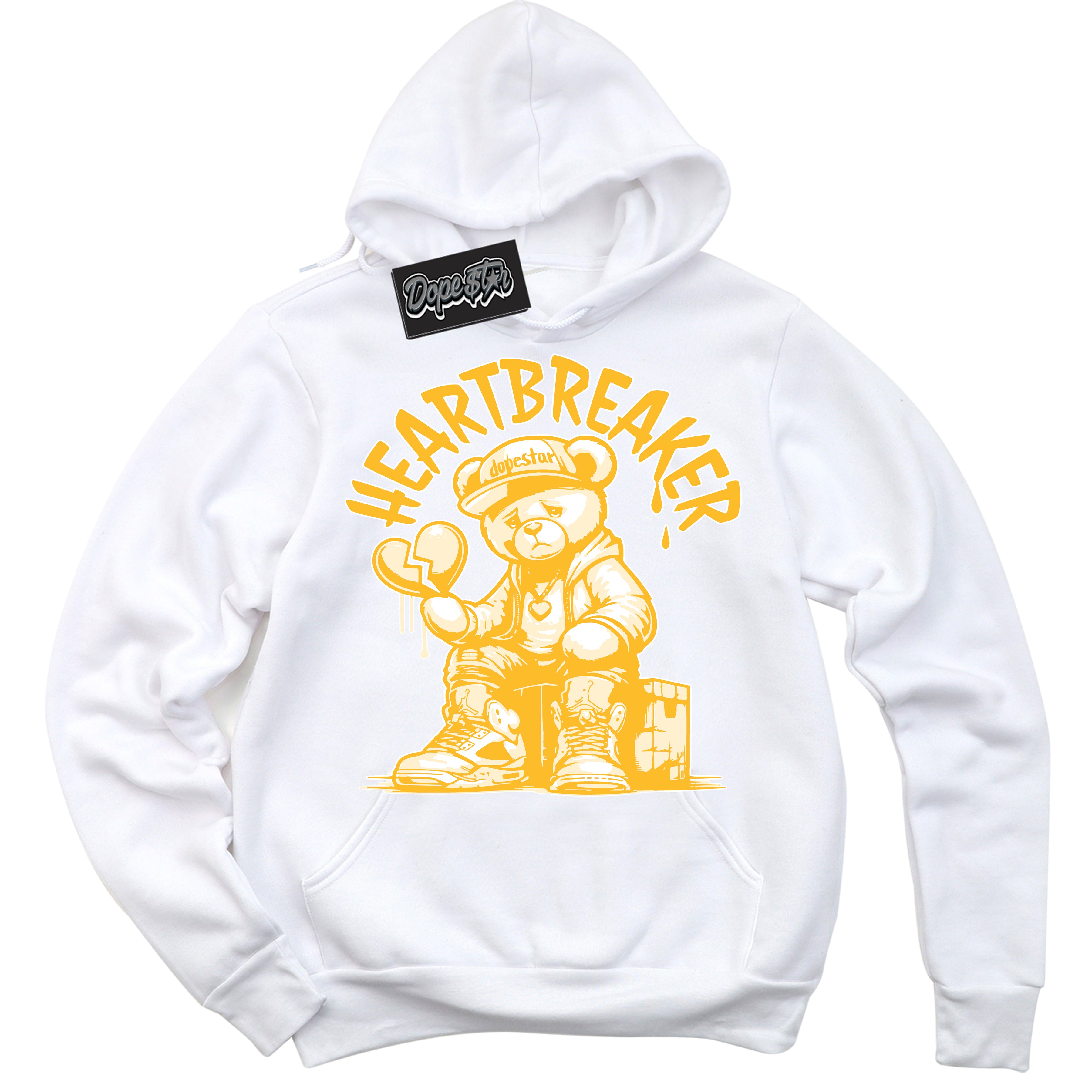 Cool White Hoodie with “ Heartbreaker Bear '' design that Perfectly Matches White University Gold Sneakers.