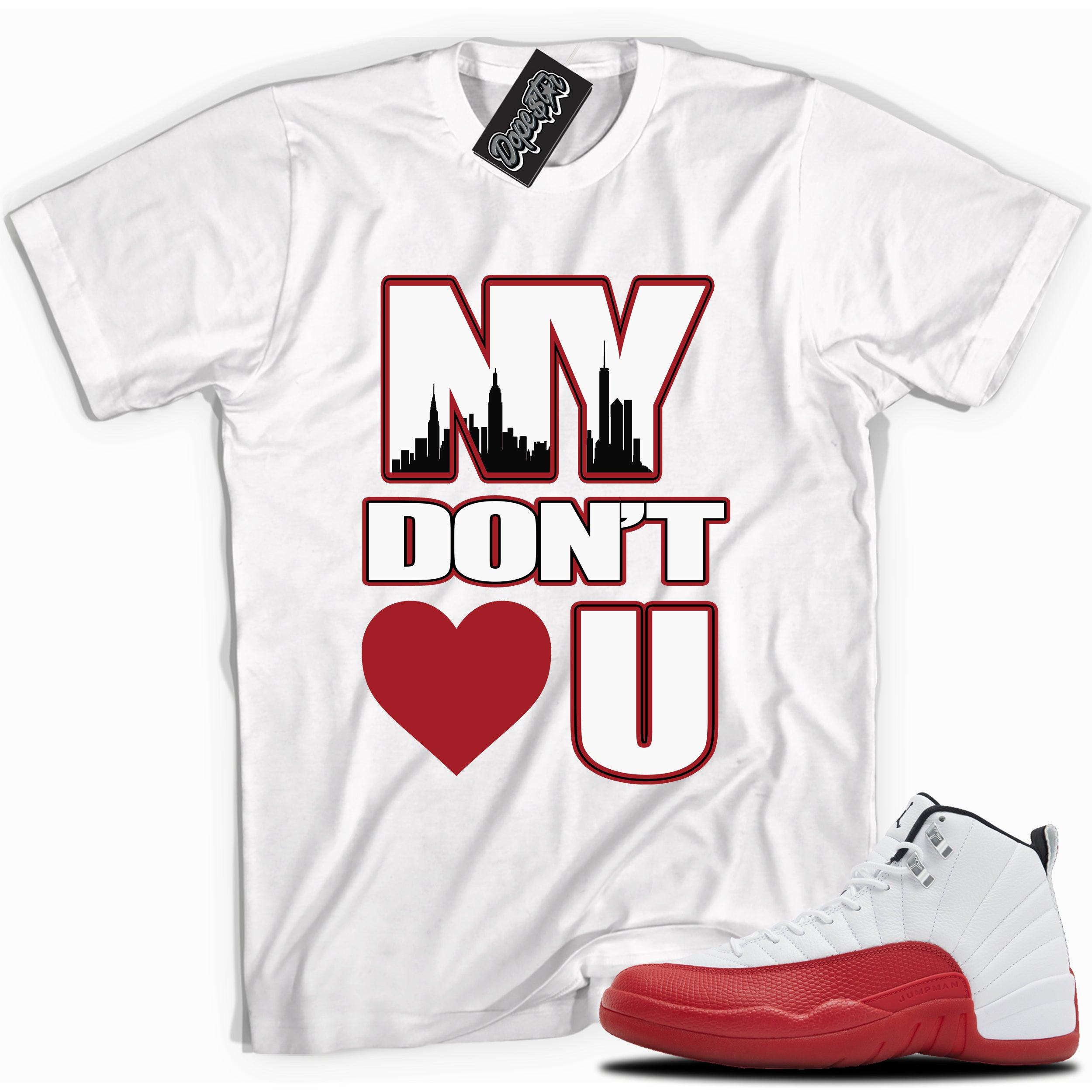 Cool White graphic tee with “NY DONT LOVE YOU” print, that perfectly matches Air Jordan 12 Retro Cherry Red 2023 red and white sneakers