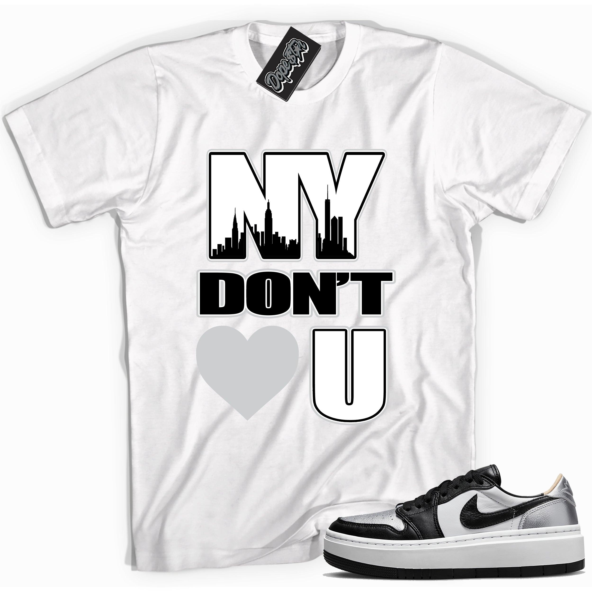 Cool white graphic tee with 'NY Don't Love You New York' print, that perfectly matches Air Jordan 1 Elevate Low SE Silver Toe sneakers.