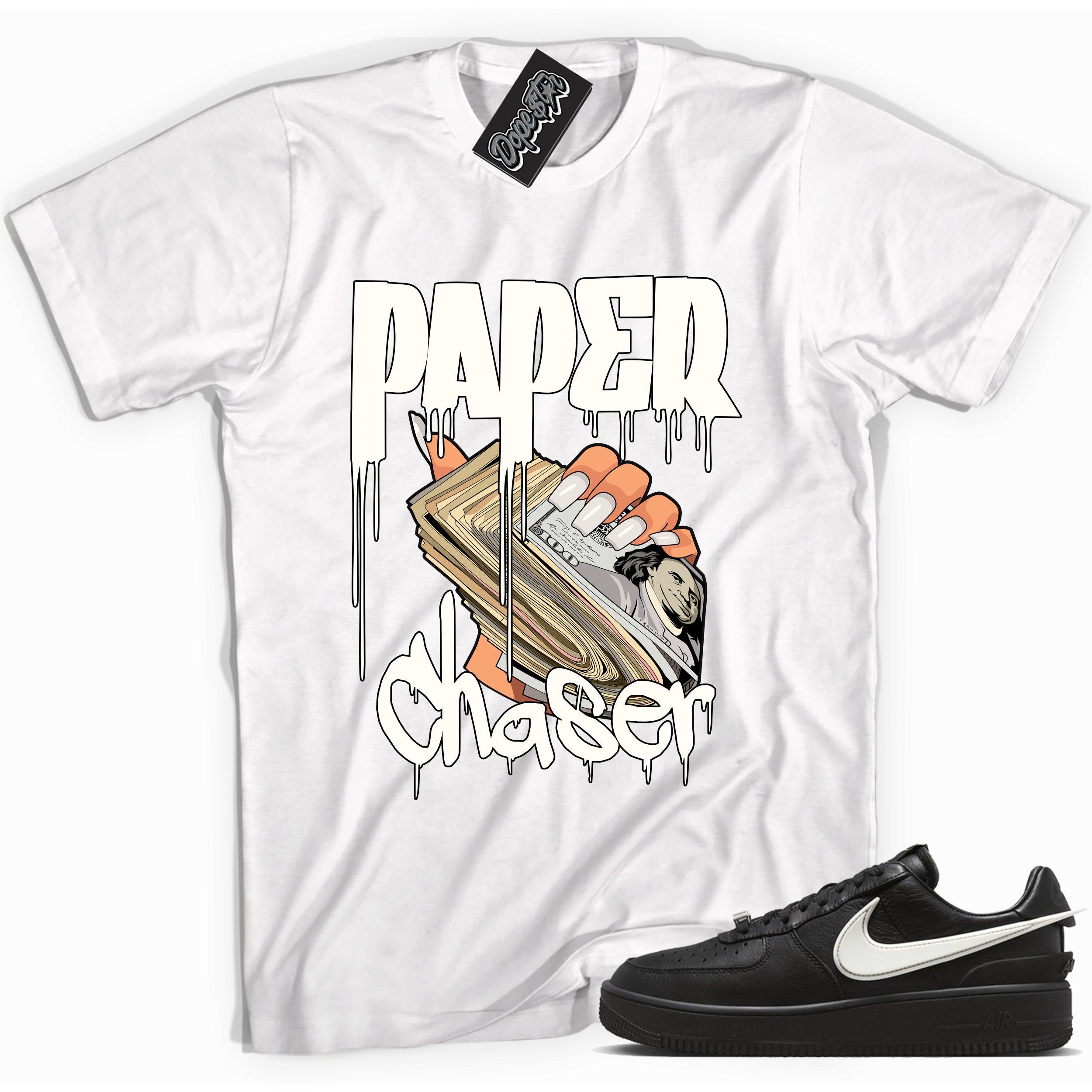 Cool white graphic tee with 'paper chaser' print, that perfectly matches Nike Air Force 1 Low SP Ambush Phantom sneakers.