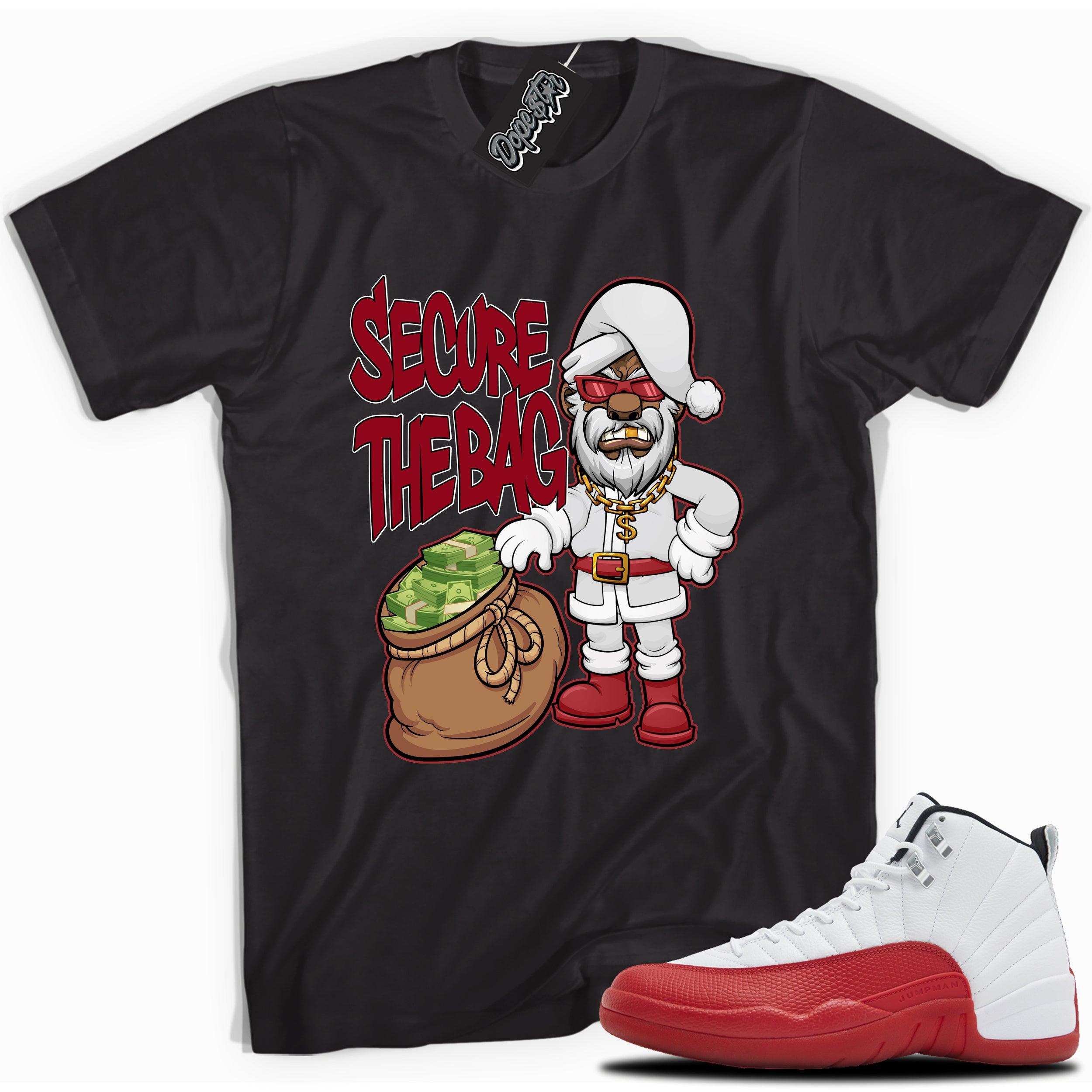 Cool Black graphic tee with “Secure The Bag Santa” print, that perfectly matches Air Jordan 12 Retro Cherry Red 2023 red and white sneakers