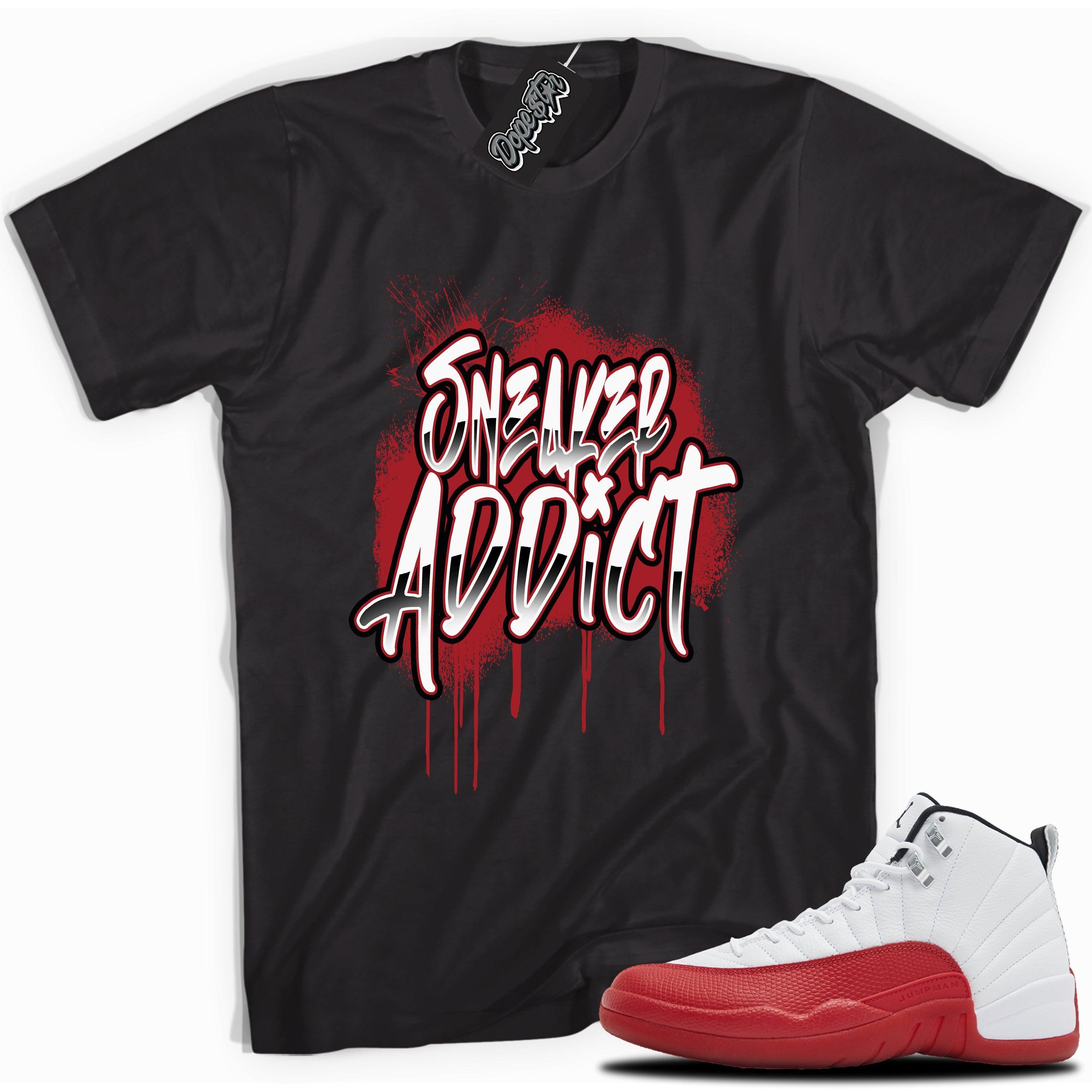 Cool Black graphic tee with “Sneaker Addict” print, that perfectly matches Air Jordan 12 Retro Cherry Red 2023 red and white sneakers