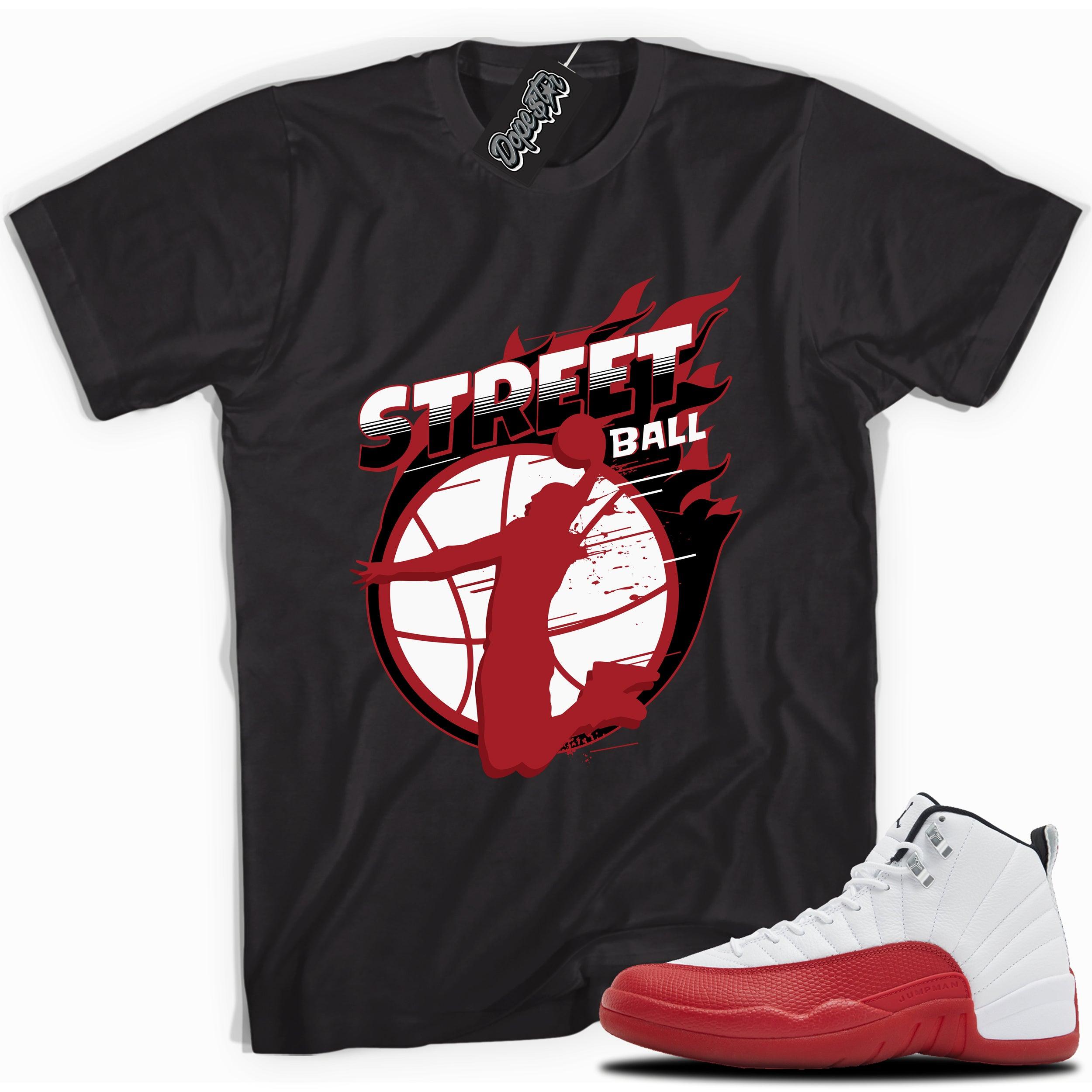 Cool Black graphic tee with “Street Ball” print, that perfectly matches Air Jordan 12 Retro Cherry Red 2023 red and white sneakers