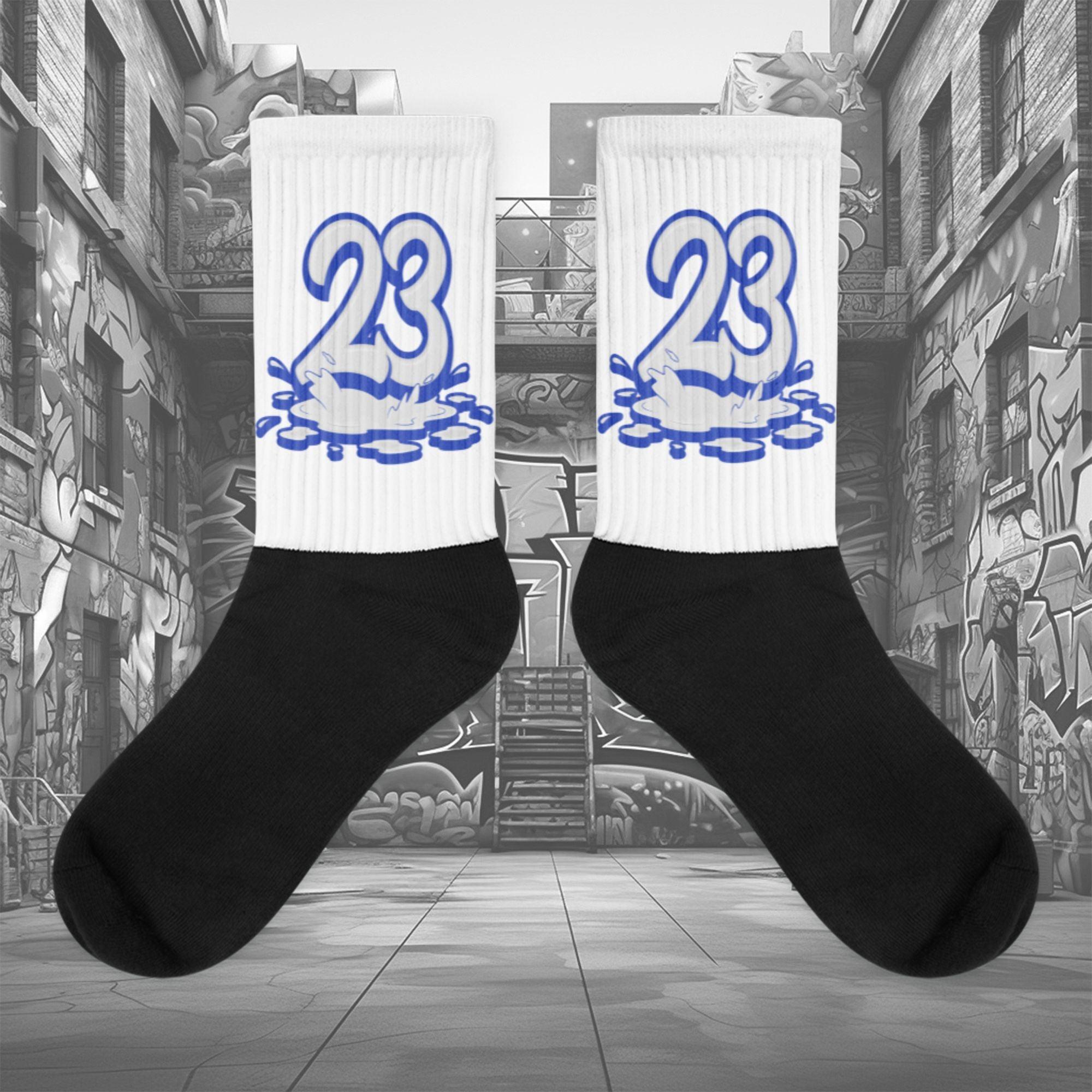 Showcases the view of the socks, highlighting the vibrant ' MEDUSA ' design, which perfectly complements the Nike Dunk Disrupt 2 Hyper Royal sneakers. The intricate pattern and color scheme inspired by the theme are prominently displayed. Focusing on the ribbed leg , cusioned bottoms and the snug fit of the socks. This angle provides a clear view of the texture and quality of the material blend.