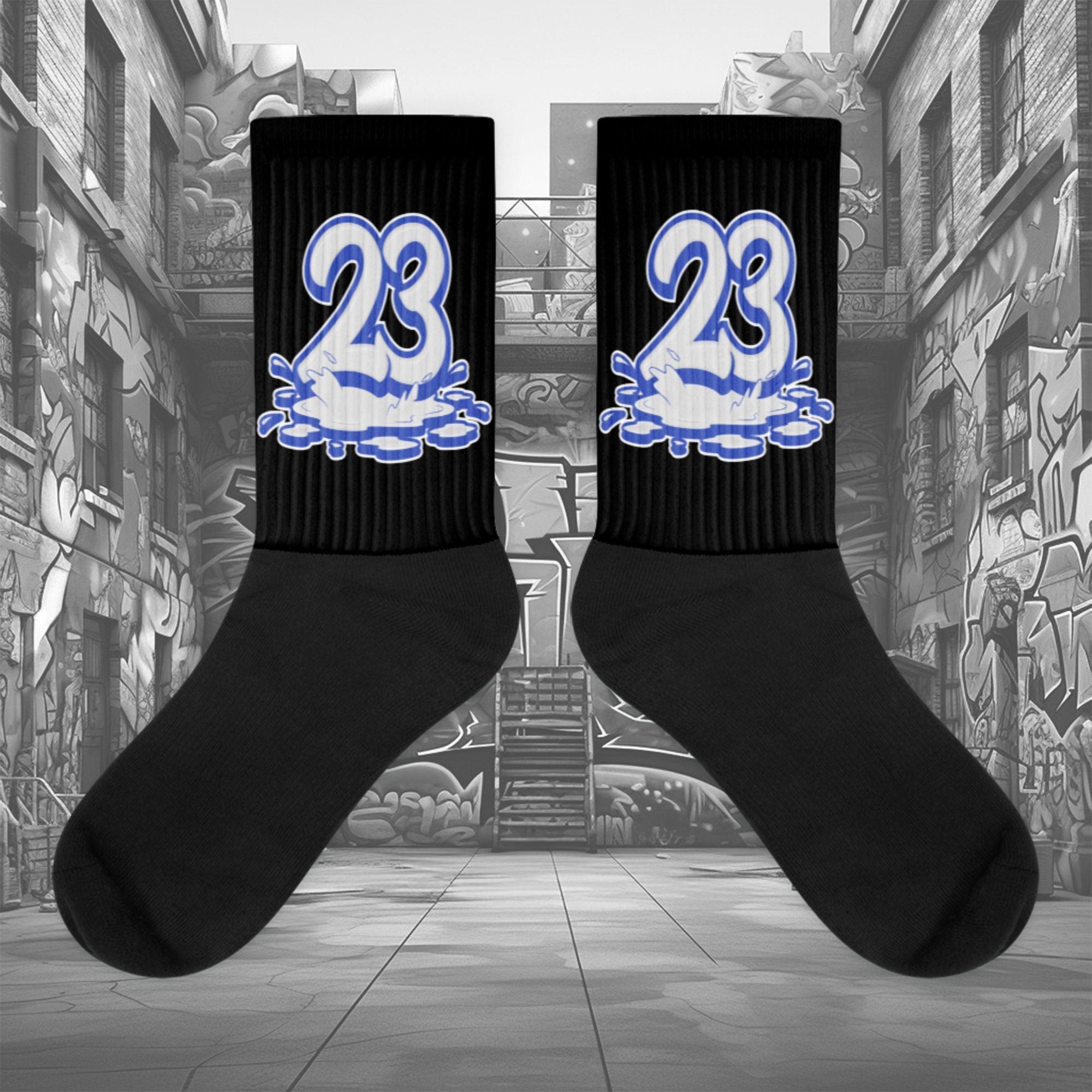 Showcases the view of the socks, highlighting the vibrant ' MEDUSA ' design, which perfectly complements the Nike Dunk Disrupt 2 Hyper Royal sneakers. The intricate pattern and color scheme inspired by the theme are prominently displayed. Focusing on the ribbed leg , cusioned bottoms and the snug fit of the socks. This angle provides a clear view of the texture and quality of the material blend.