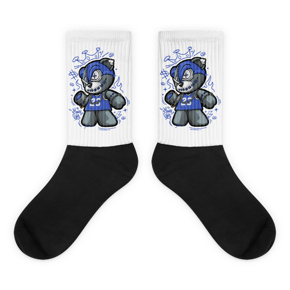 Showcases the view of the socks, highlighting the vibrant ' MEDUSA ' design, which perfectly complements the Nike Dunk Disrupt 2 Hyper Royal sneakers. The intricate pattern and color scheme inspired by the theme are prominently displayed. Focusing on the ribbed leg , cusioned bottoms and the snug fit of the socks. This angle provides a clear view of the texture and quality of the material blend.