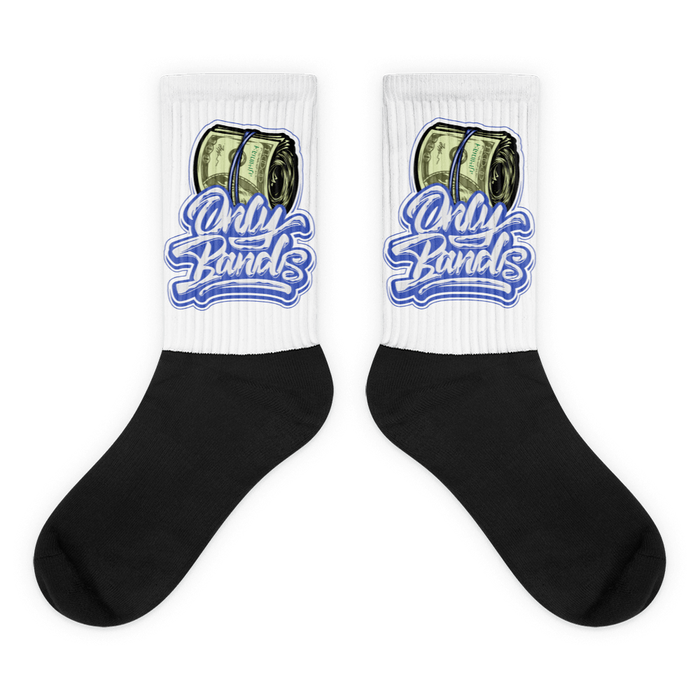 Showcases the view of the socks, highlighting the vibrant ' MEDUSA ' design, which perfectly complements the Nike Dunk Disrupt 2 Hyper Royal sneakers. The intricate pattern and color scheme inspired by the theme are prominently displayed. Focusing on the ribbed leg , cusioned bottoms and the snug fit of the socks. This angle provides a clear view of the texture and quality of the material blend.