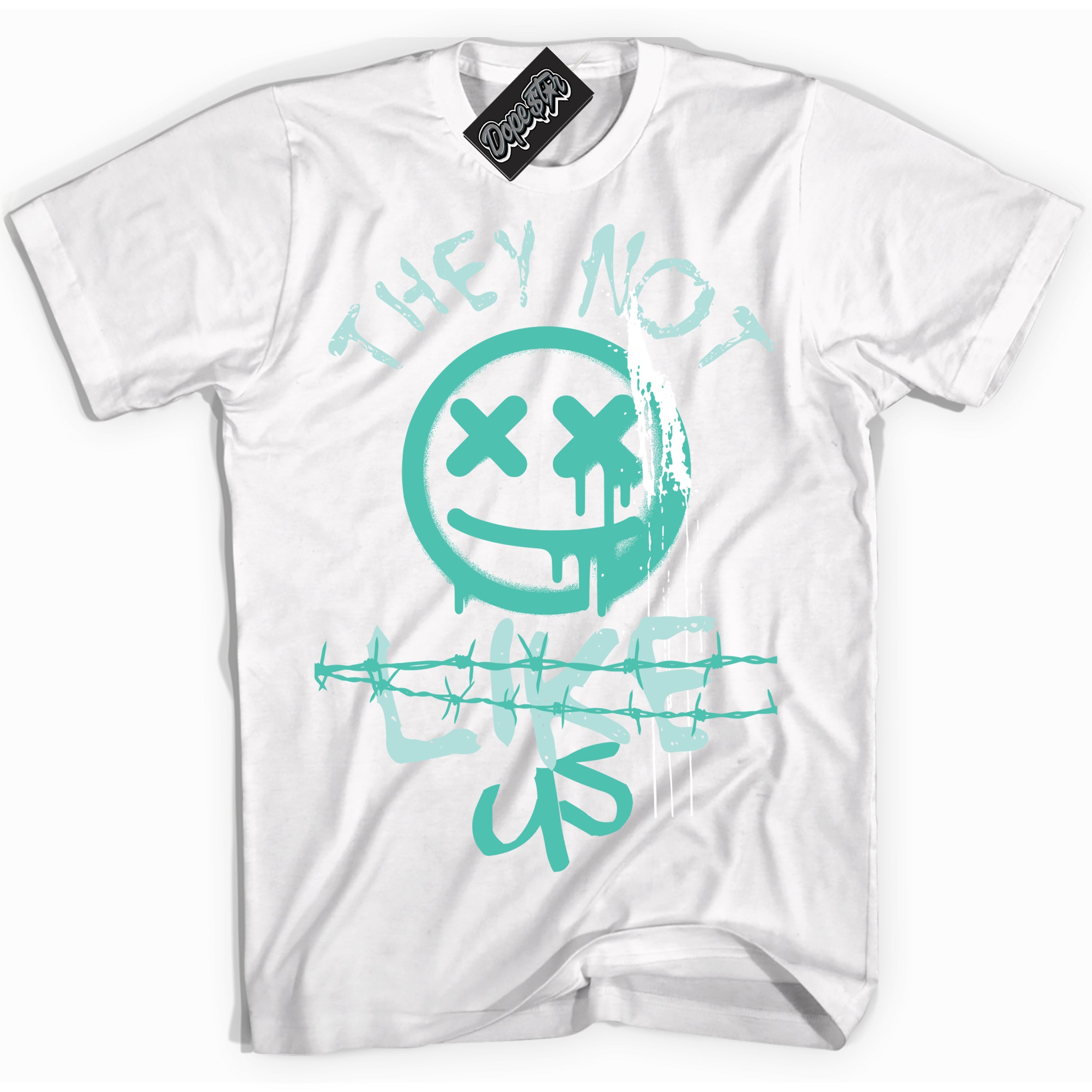 White “They Not Like Us” T-shirt by Dope Star Brand®, styled to match Washed Teal 1s sneakers
