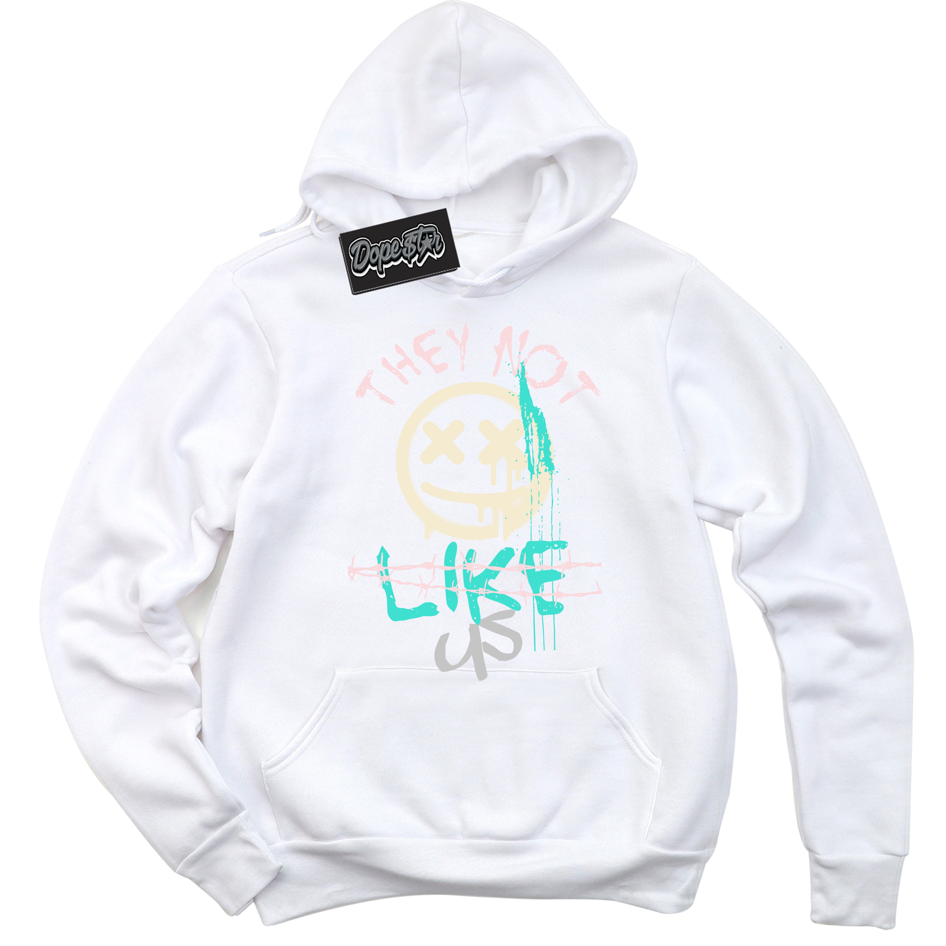 White “They Not Like Us” Hoodie by Dope Star Brand®, styled to match Soft Pearl 1s sneakers