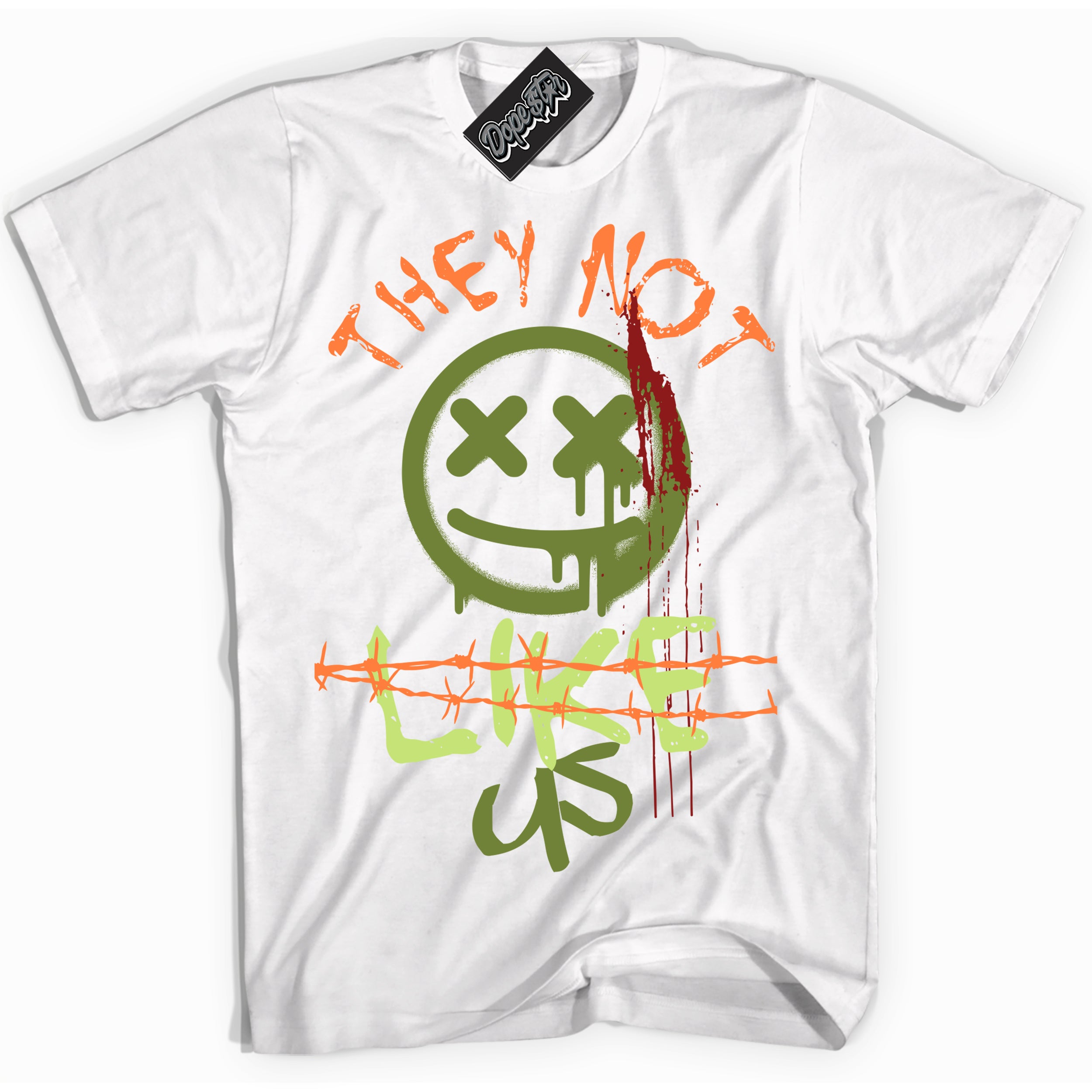 White “They Not Like Us” T-shirt by Dope Star Brand®, styled to match Green Curry Dunk sneakers