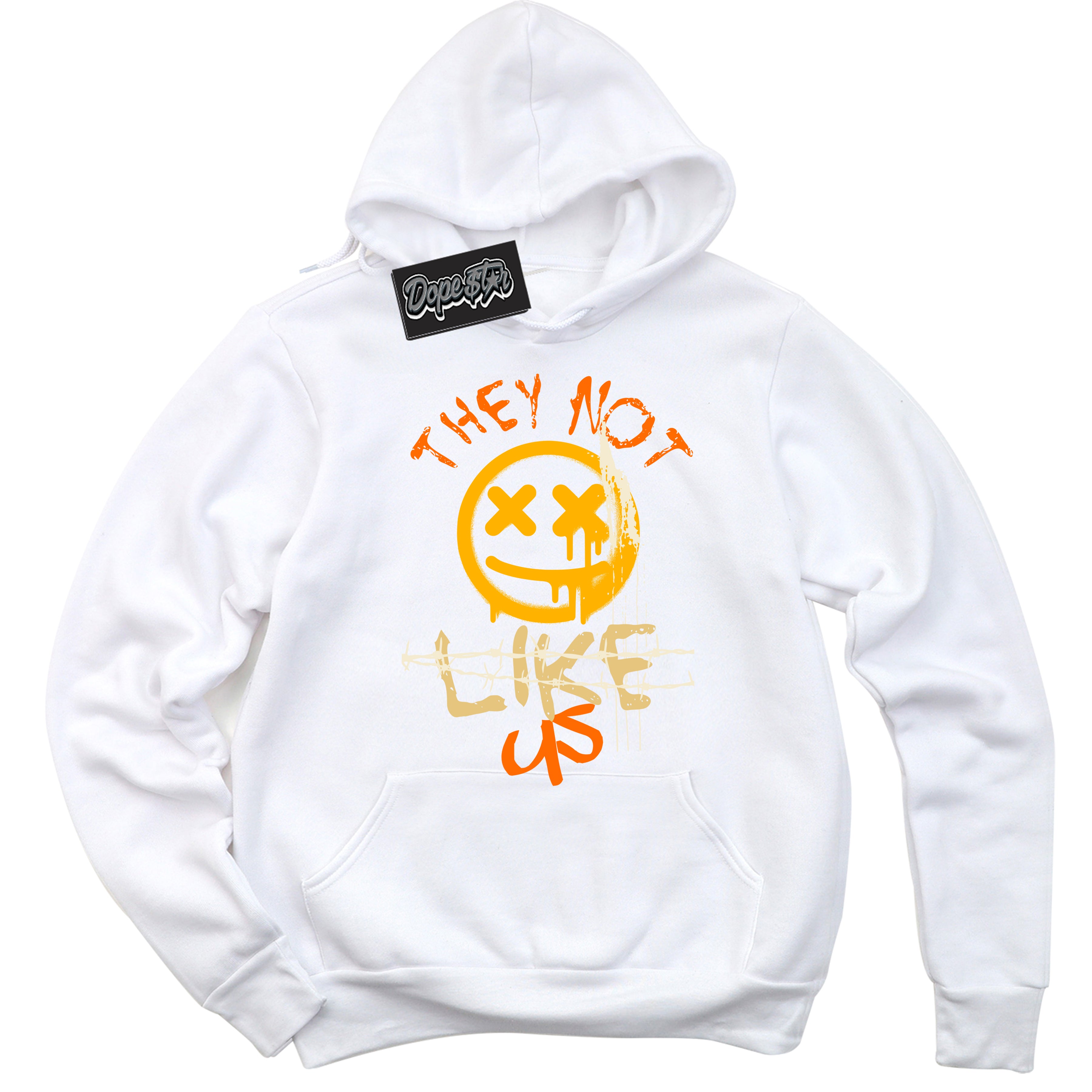 White “They Not Like Us” Hoodie by Dope Star Brand®, styled to match Saturn Gold Dunk sneakers