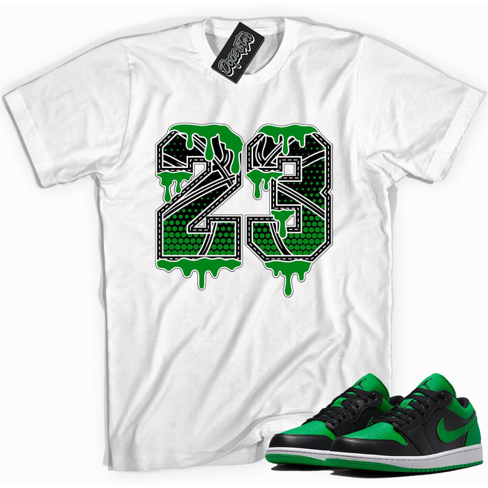 Cool white graphic tee with '23 BasketBall' print, that perfectly matches Air Jordan 1 Low Lucky Green sneakers