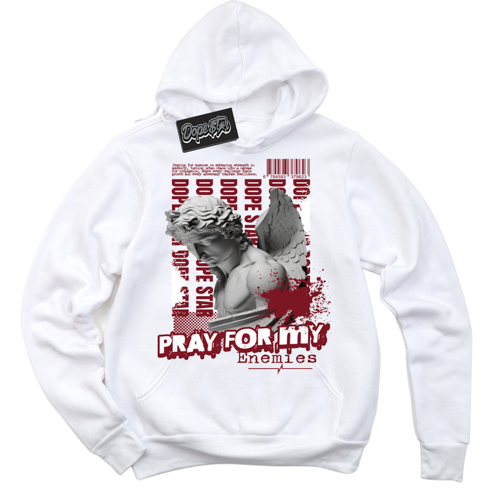 Cool White Hoodie with “ Pray Enemies ”  design that Perfectly Matches Metallic Burgundy 1s Sneakers.