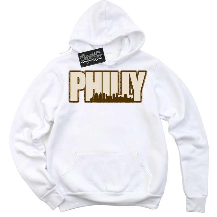 Cool White Graphic DopeStar Hoodie with “ Philly “ print, that perfectly matches Palomino 3s sneakers