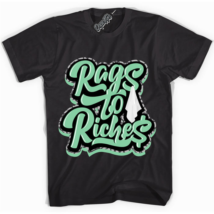 Cool Black graphic tee with “ Rags To Riches ” design, that perfectly matches Green Glow 3s sneakers 