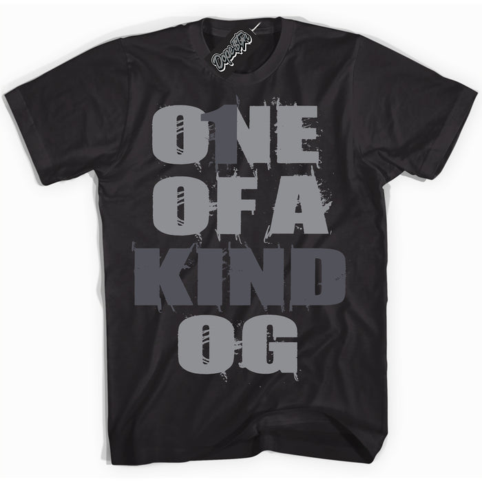 Cool Black Shirt with “ One Of A Kind ” design that perfectly matches Paris Olympics Wet Cement 4s Jordans.
