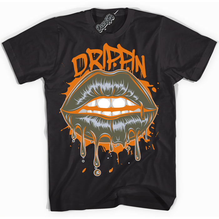 Cool Black Shirt with “ Drippin” design that perfectly matches Olive 5s Sneakers.