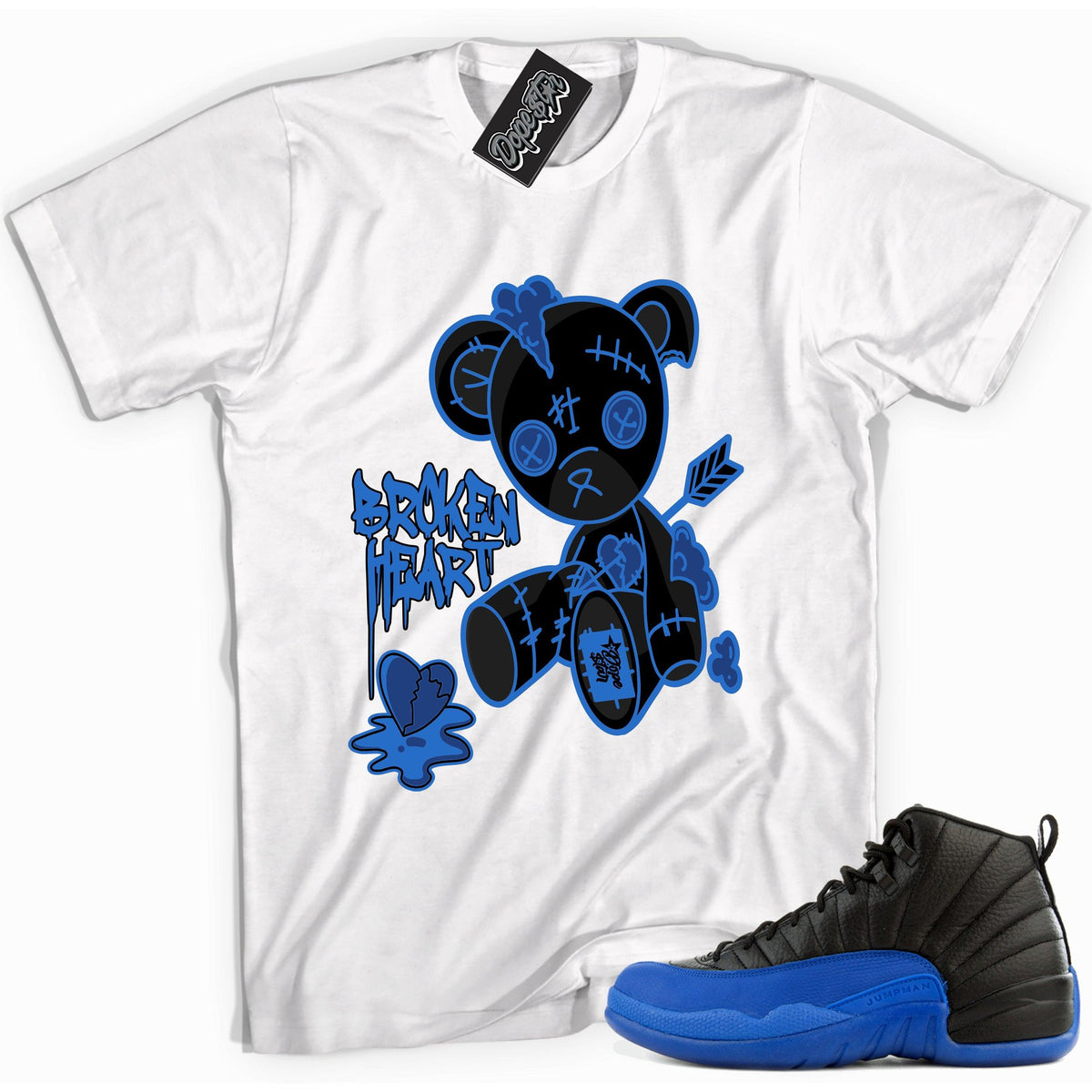 Cool white graphic tee with 'broken heart bear' print, that perfectly matches Air Jordan 12 Retro Black Game Royal sneakers.