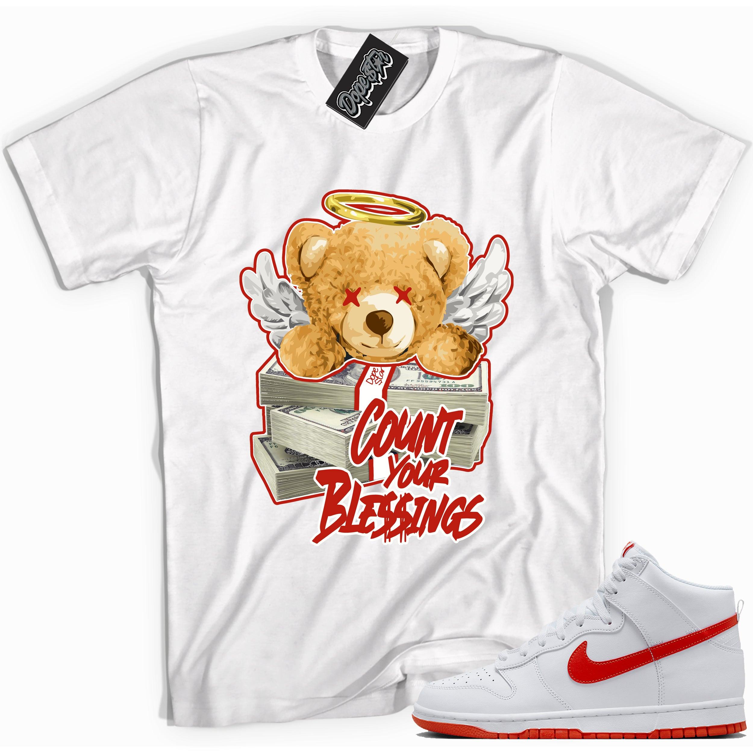 Cool white graphic tee with 'count your blessings' print, that perfectly matches Nike Dunk High White Picante Red sneakers.