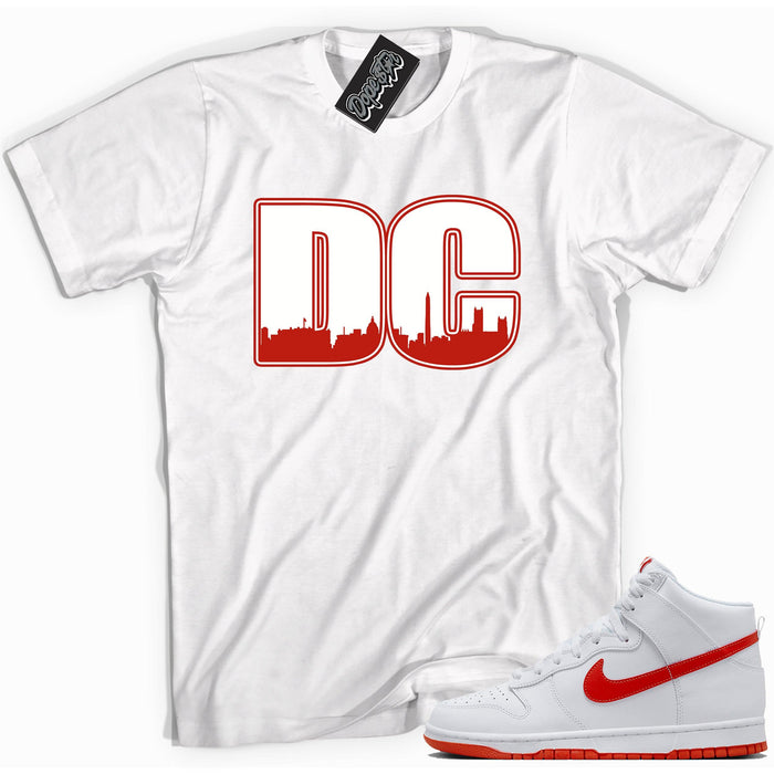 Cool white graphic tee with 'DC' print, that perfectly matches Nike Dunk High White Picante Red sneakers.