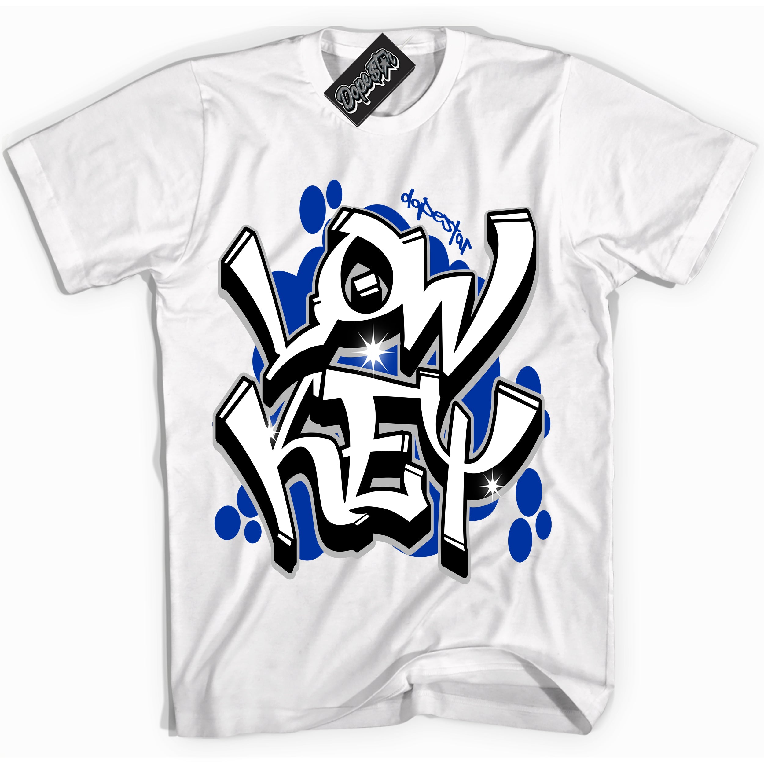 White “Low Key” T-shirt by Dope Star Brand®, styled to match Deep Royal Blue 1s sneakers