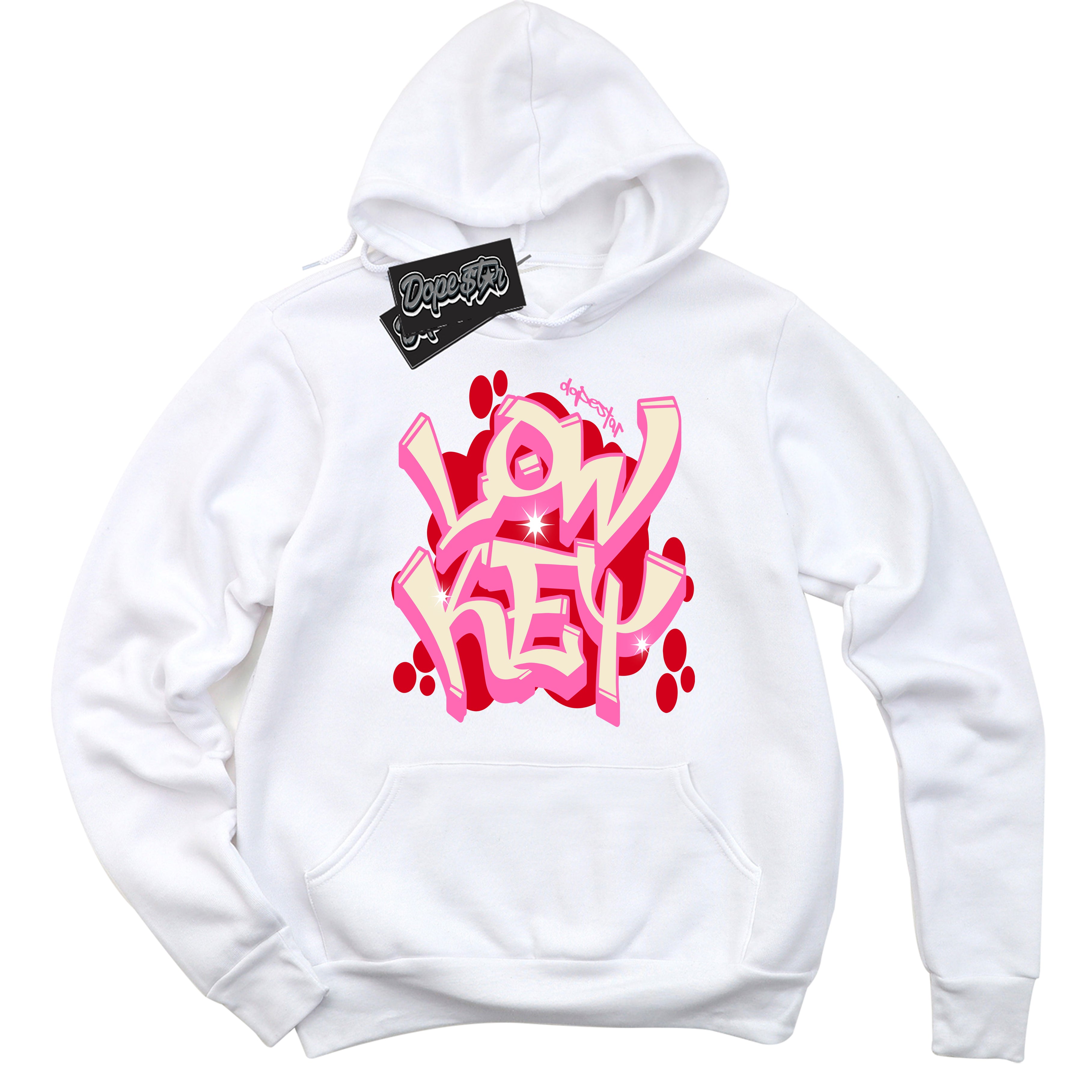 White “Low Key” Hoodie by Dope Star Brand®, styled to match Pink Satin 1s sneakers