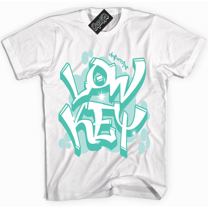 White “Low Key” T-shirt by Dope Star Brand®, styled to match Teal 1s sneakers