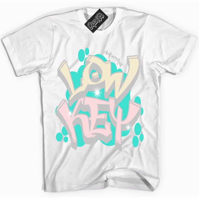White “Low Key” T-shirt by Dope Star Brand®, styled to match Soft Pearl 1s sneakers
