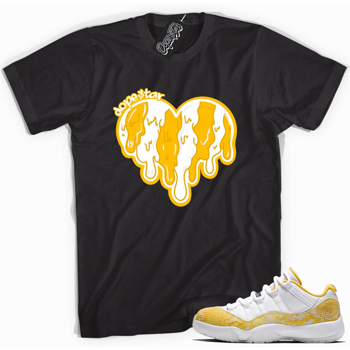 Cool black graphic tee with 'melting heart' print, that perfectly matches  Air Jordan 11 Low Yellow Snakeskin sneakers