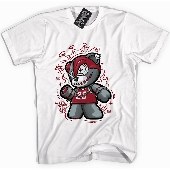 Cool White graphic tee with “ Money Gang Bear ” print, that perfectly matches OG Metallic Burgundy 1s sneakers 