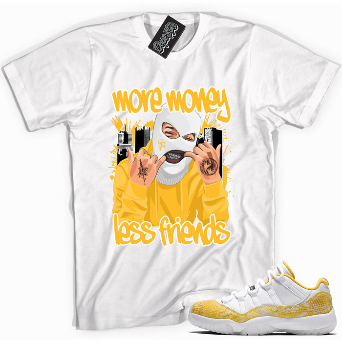 Cool white graphic tee with 'more money less friends' print, that perfectly matches Air Jordan 11 Low Yellow Snakeskin sneakers