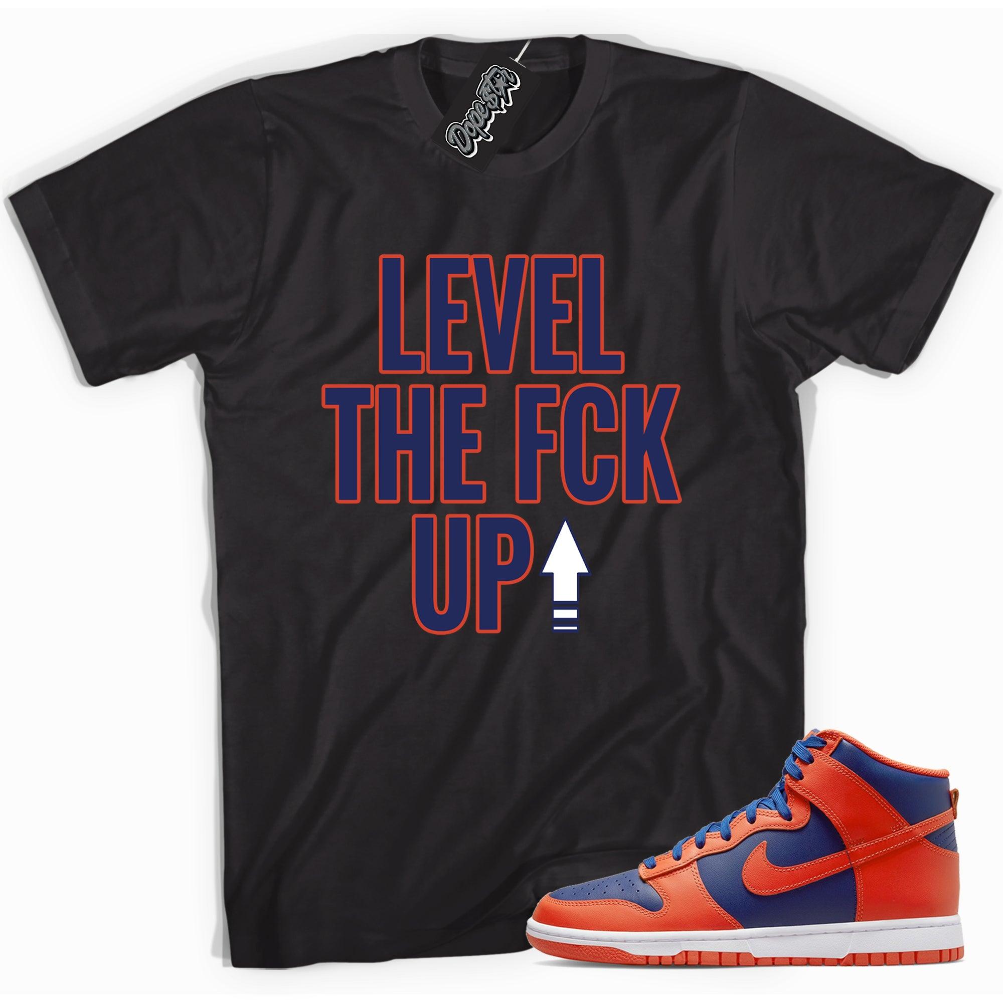 Cool black graphic tee with 'Level Up' print, that perfectly matches Nike Dunk High Knicks sneakers.