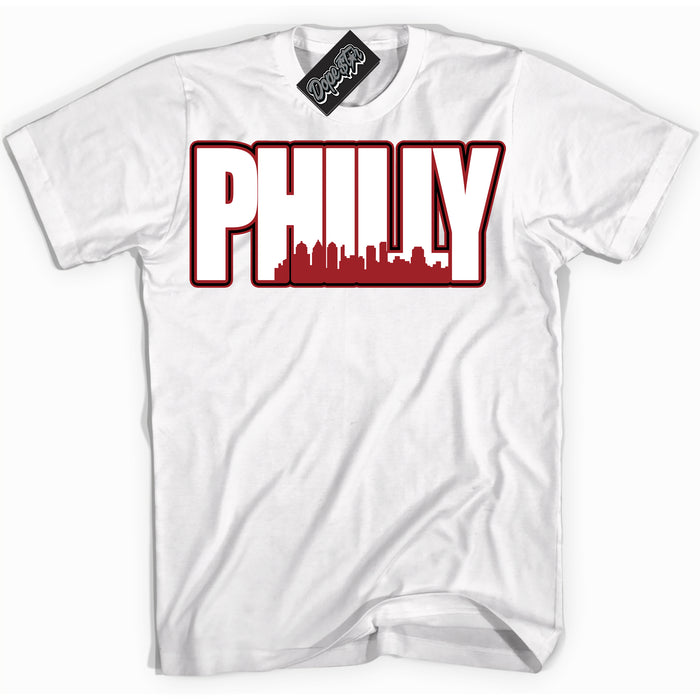 Cool White graphic tee with “ Philly ” print, that perfectly matches Lost And Found 1s sneakers 