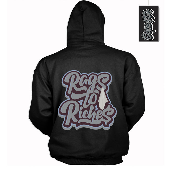 Cool Black Hoodie with “ Rags To Riches ”  design that Perfectly Matches Burgundy 5s Sneakers.