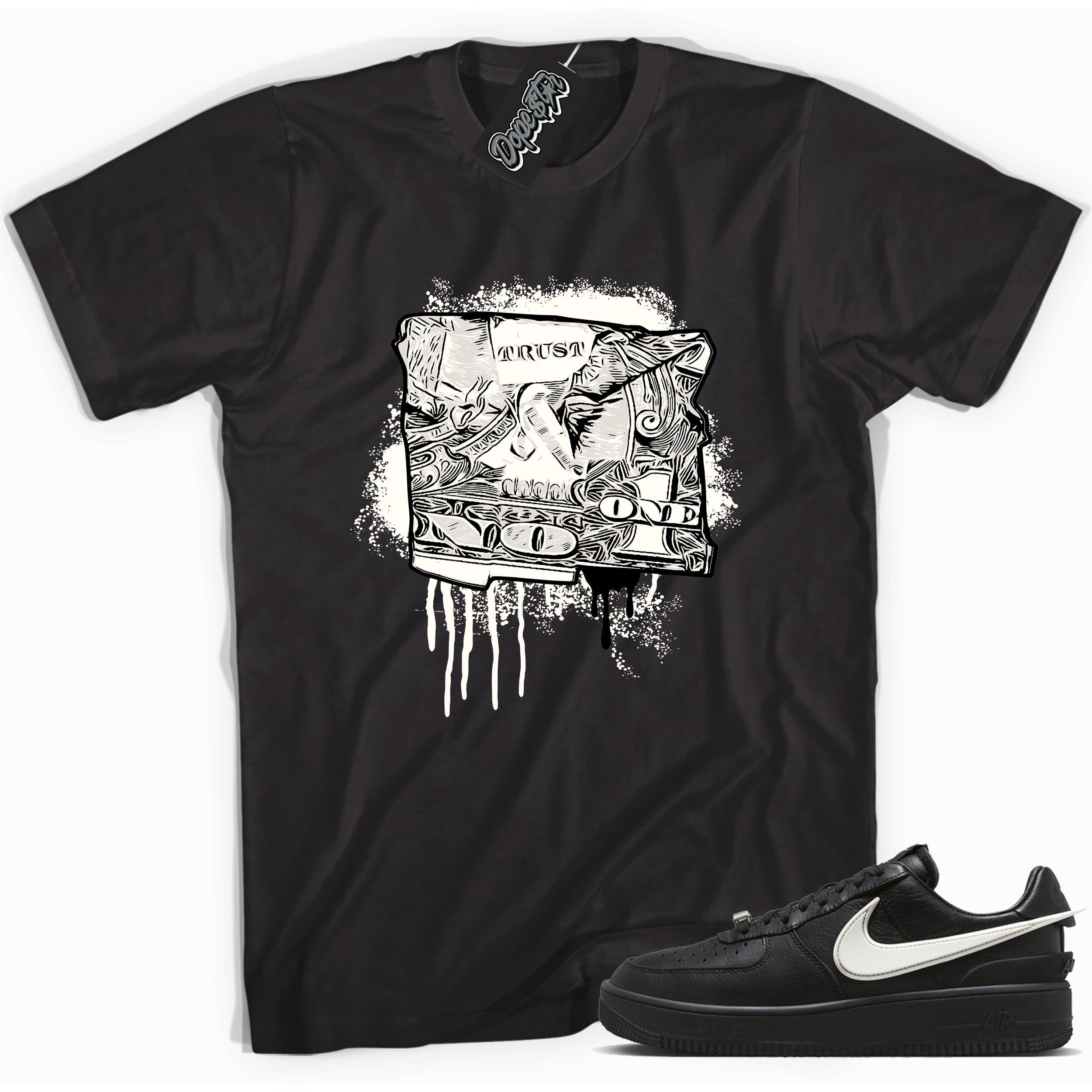 Cool black graphic tee with 'trust no one dollar bill' print, that perfectly matches Nike Air Force 1 Low SP Ambush Phantom sneakers.