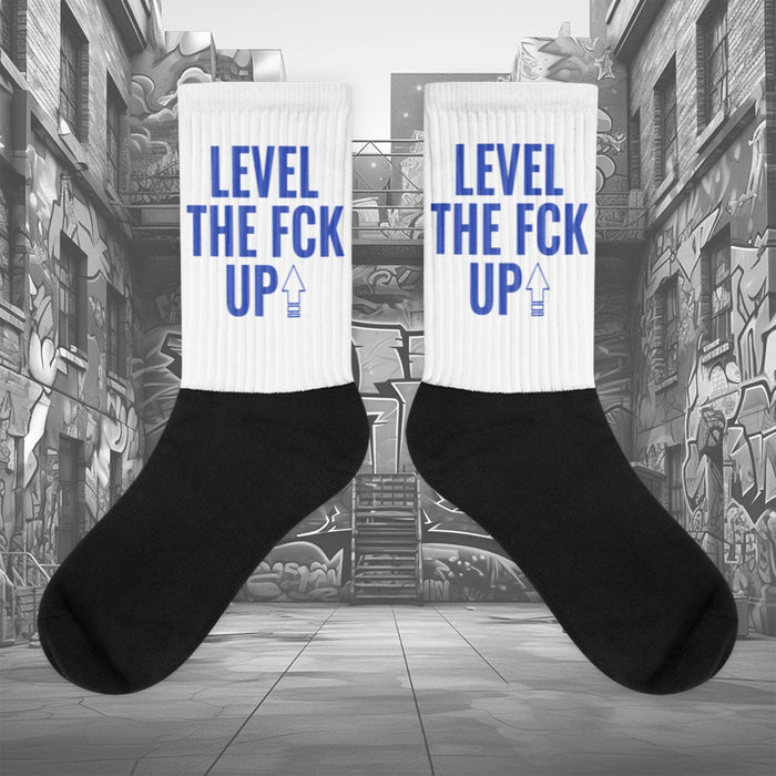  Showcases the view of the socks, highlighting the vibrant ' MEDUSA ' design, which perfectly complements the Nike Dunk Disrupt 2 Hyper Royal sneakers. The intricate pattern and color scheme inspired by the  theme are prominently displayed.  Focusing on the ribbed leg , cusioned bottoms and the snug fit of the socks. This angle provides a clear view of the texture and quality of the material blend.