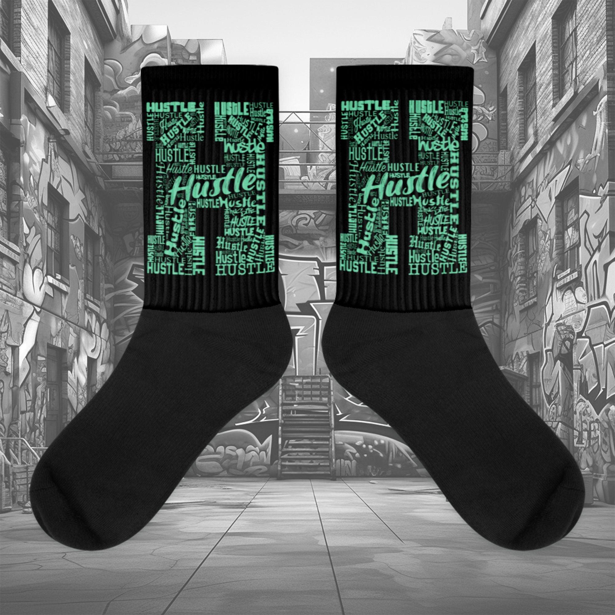  Showcases the view of the socks, highlighting the vibrant ' Hustle ' design, which perfectly complements the Nike Dunk Green Glow sneakers. The intricate pattern and color scheme inspired by the  theme are prominently displayed.  Focusing on the ribbed leg , cusioned bottoms and the snug fit of the socks. This angle provides a clear view of the texture and quality of the material blend.