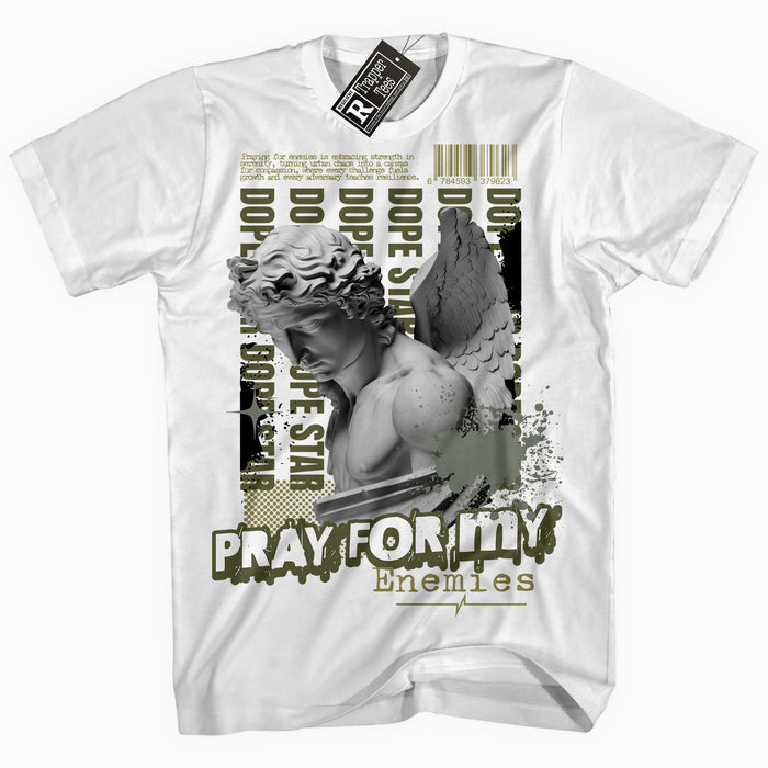 Cool White graphic tee with “ Pray Enemies ” print, that perfectly matches Craft Olive 4s sneakers 