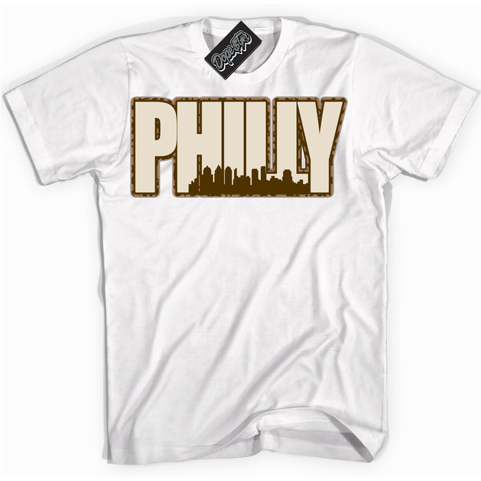 Cool White graphic tee with “ Philly ” design, that perfectly matches Palomino 3s sneakers 