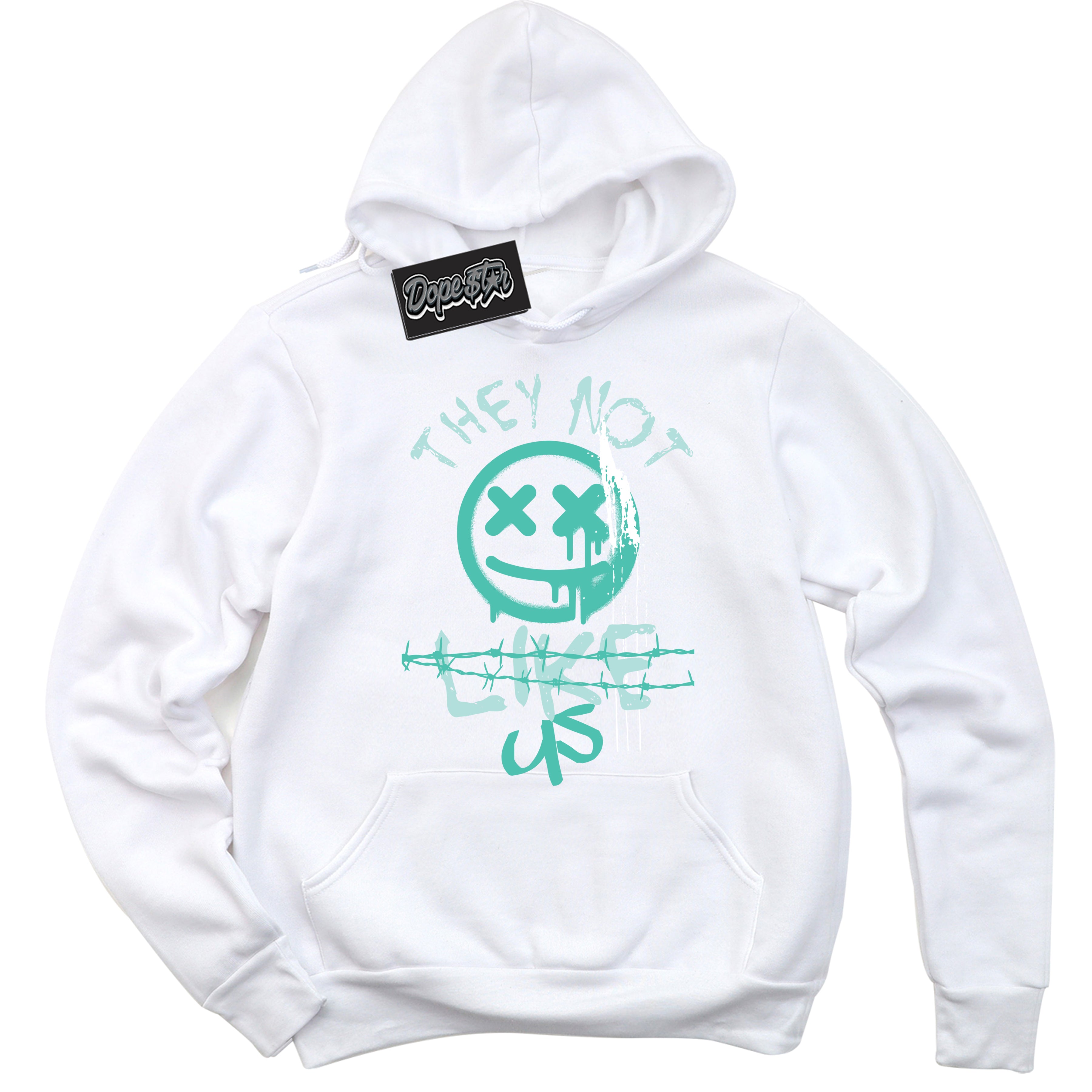 White “They Not Like Us” Hoodie by Dope Star Brand®, styled to match Washed Teal 1s sneakers