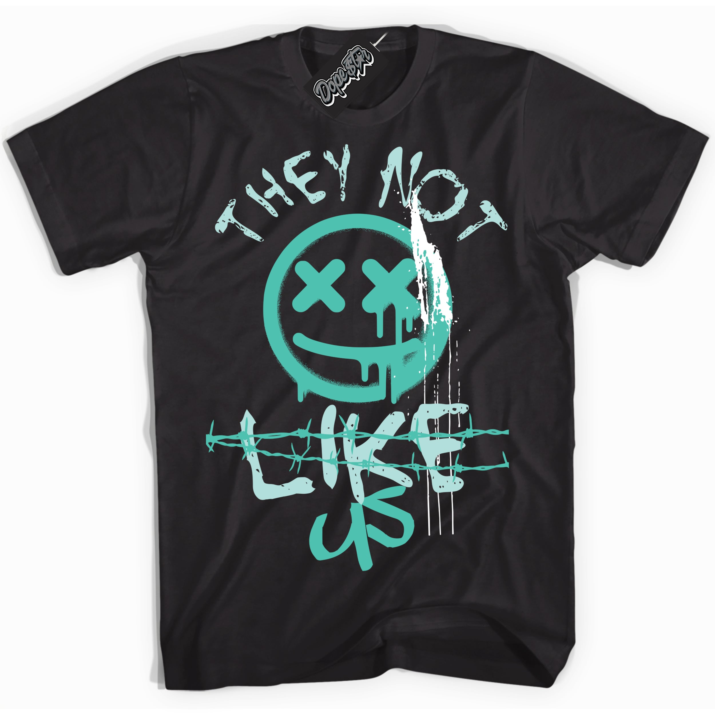Black “They Not Like Us” T-shirt by Dope Star Brand®, styled to match Washed Teal 1s sneakers
